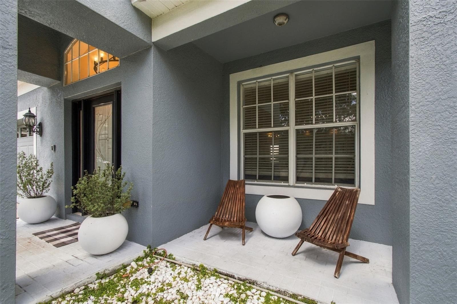 Enjoy your quiet front porch. - 19025 FISHERMANS BEND DR, LUTZ