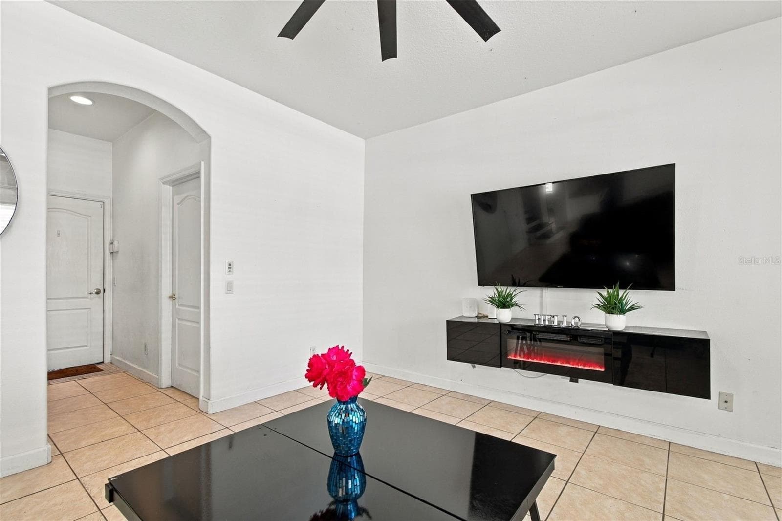 Your home's private hallway to the garage, secluded laundry room and poweder boutique style half bathroom. - 19025 FISHERMANS BEND DR, LUTZ