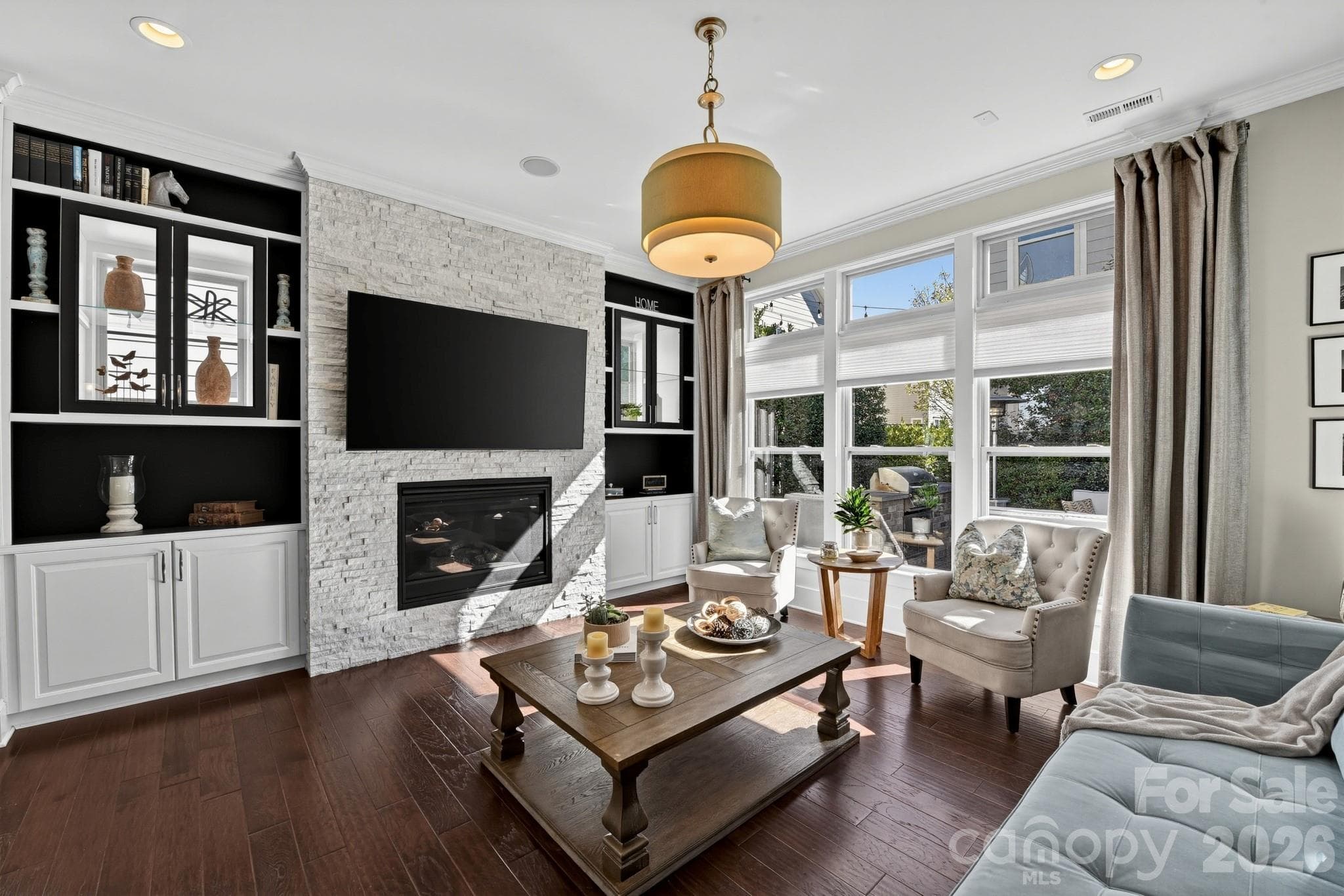 Custom built-in cabinetry surrounding the fireplace - 13013 Jacks Lane, Pineville