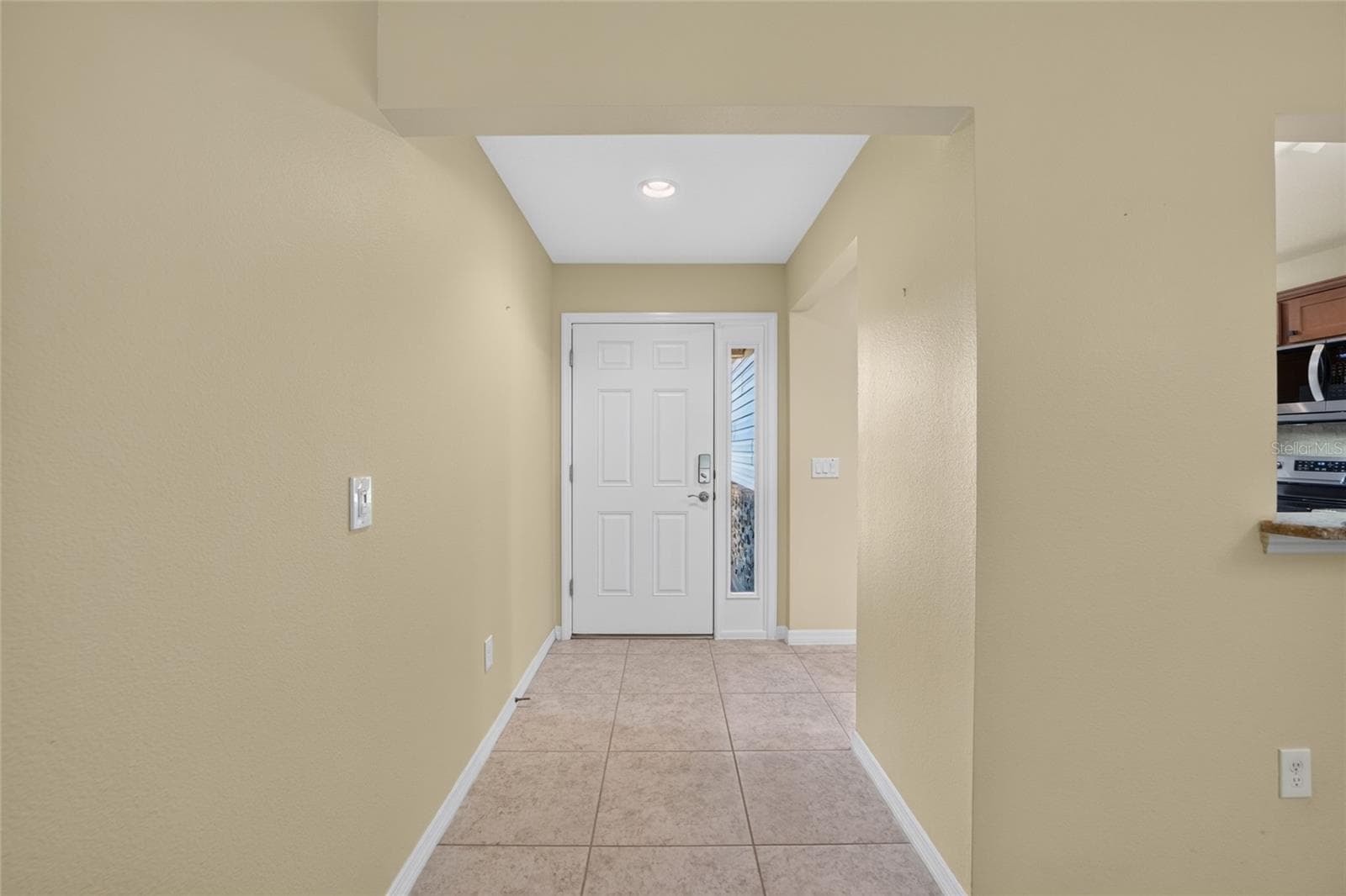 Front door with side light & keyless entry - 3552 WYNGATE PL, THE VILLAGES
