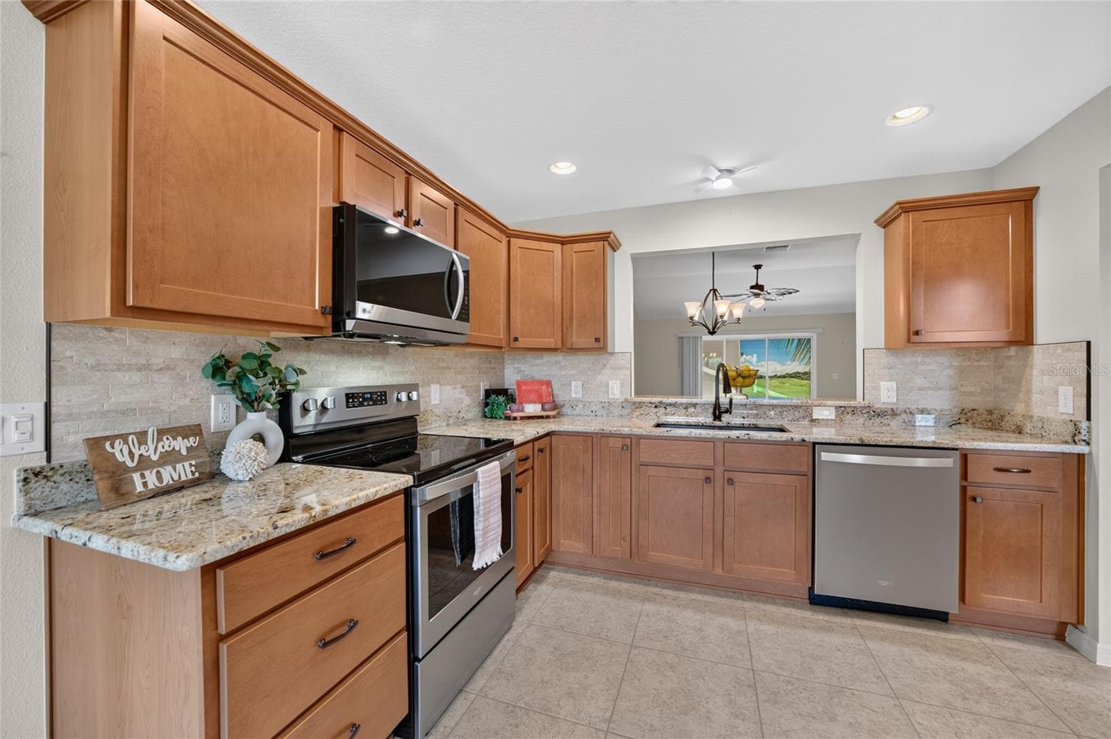 Tile Backsplash & Stainless Steel Appliances - 3552 WYNGATE PL, THE VILLAGES