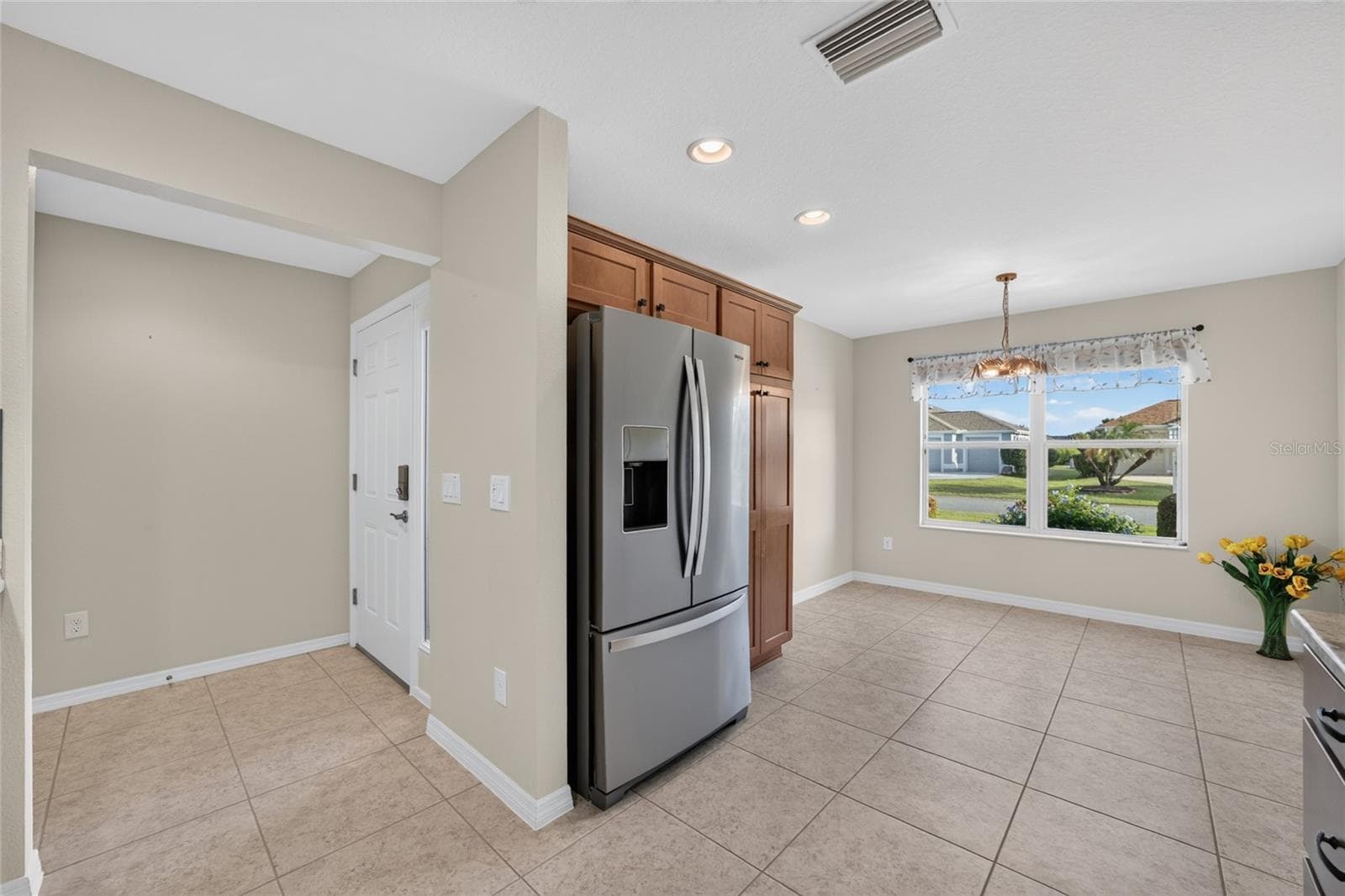 Tile Flooring in Kitchen and Foyer - 3552 WYNGATE PL, THE VILLAGES