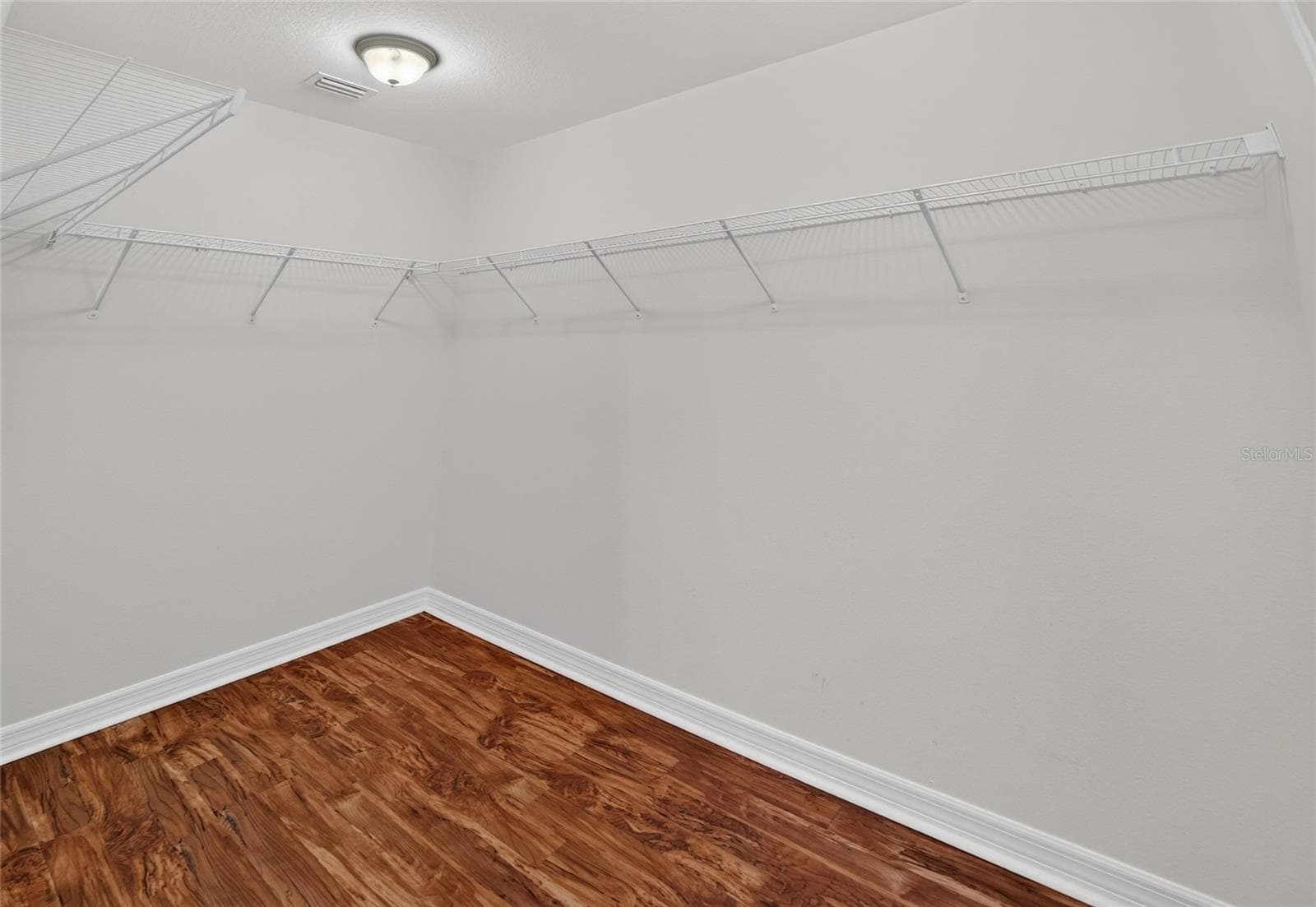 Spacious primary walk-in closet - 3552 WYNGATE PL, THE VILLAGES