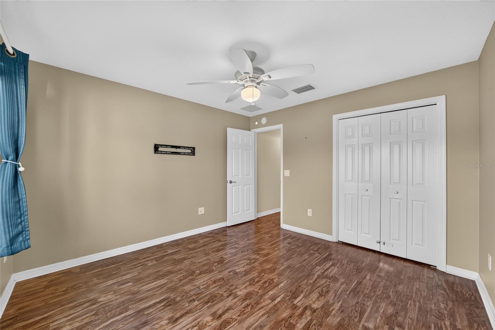 Bedroom 2 with Built-in Closet and TV Mount - 3552 WYNGATE PL, THE VILLAGES
