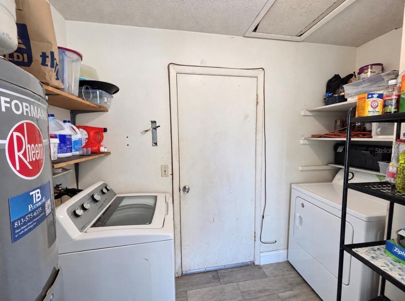 2026 water heater. Laundry room with attic access. - 6745 LARCH LN, ORLANDO