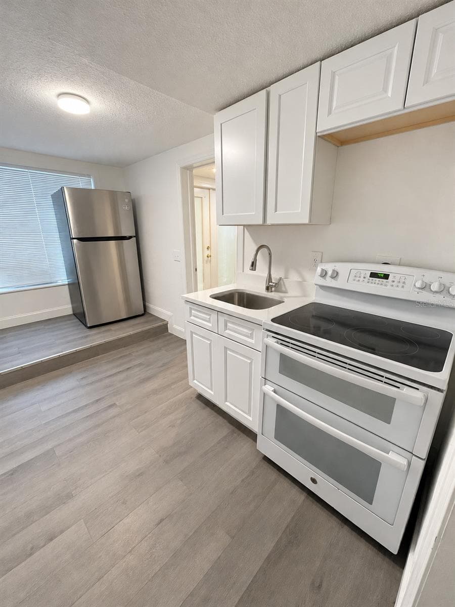 Quadruplex at 104 S GROVE ST, EUSTIS, photo 8 of 14