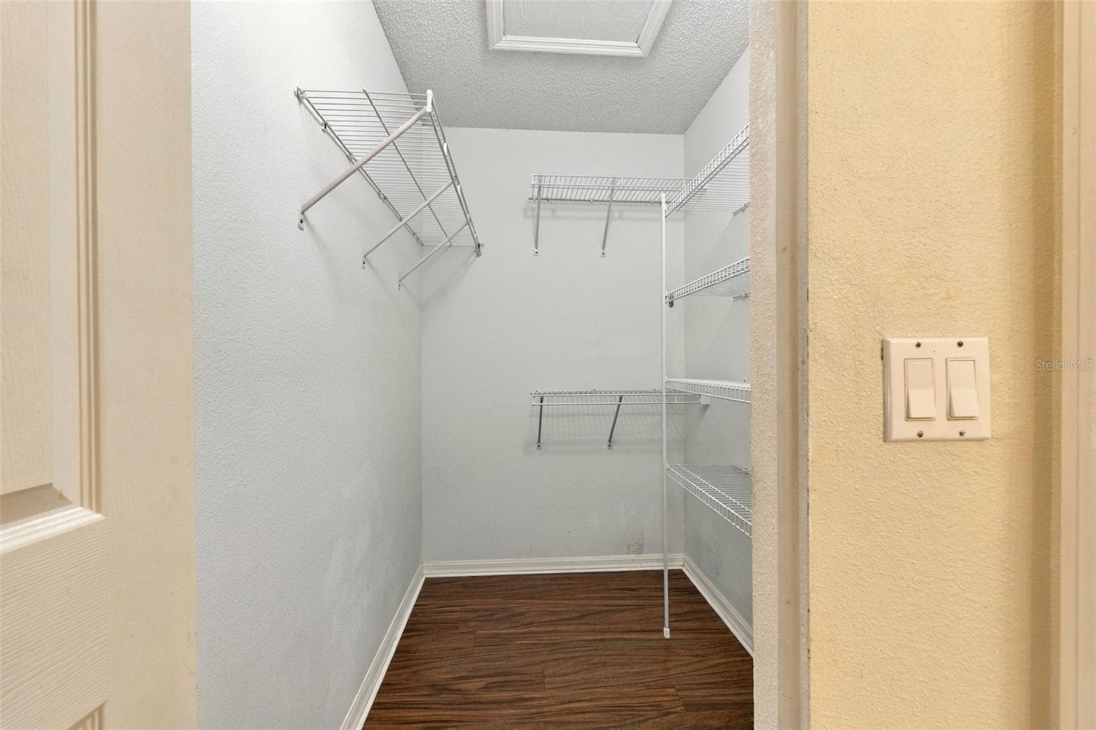 Primary bedroom walk-in closet - 1149 WOLFORD DR, NEW PORT RICHEY