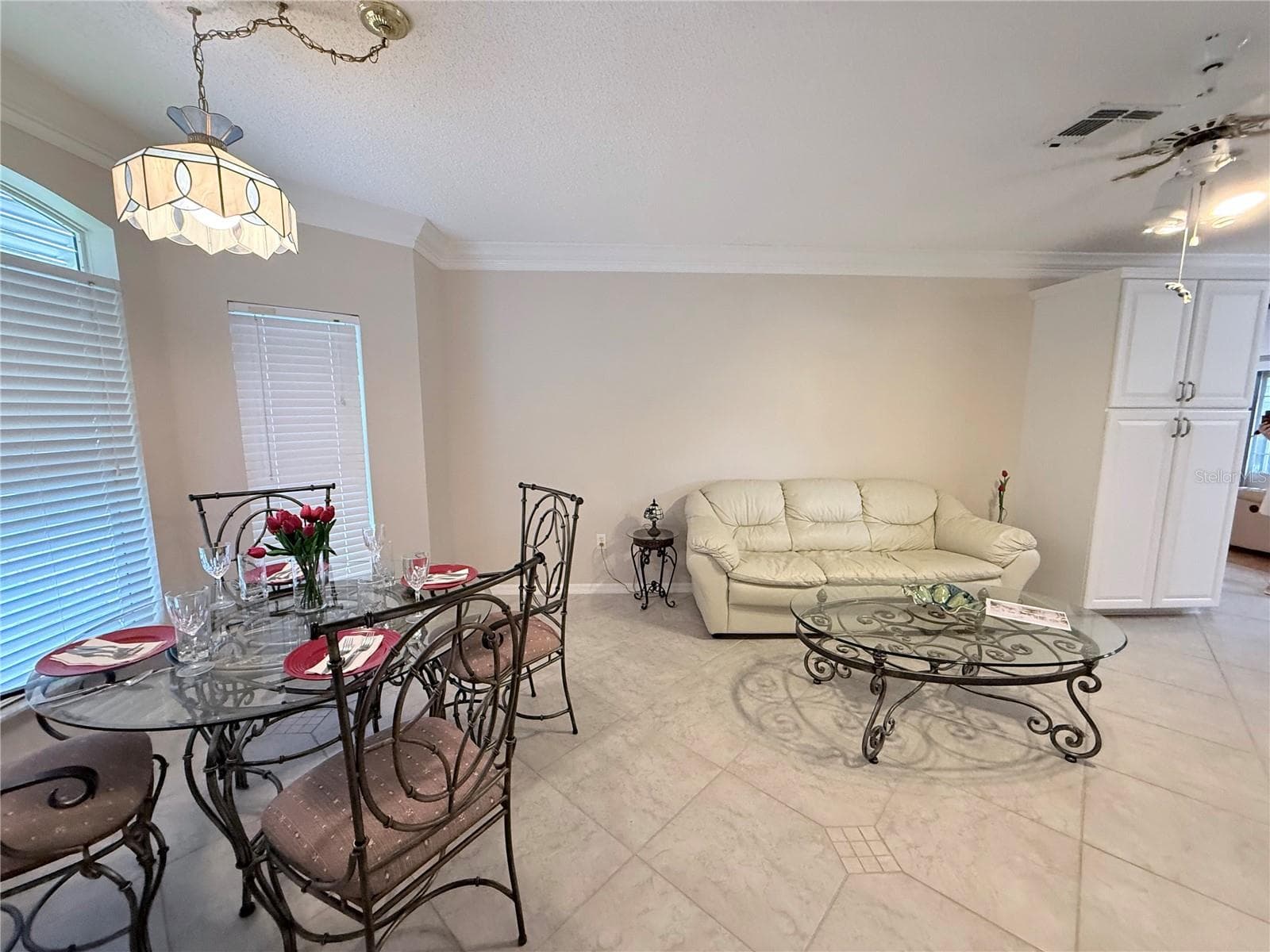 Dining table with golf course views in Keeping Room - 1230 DESILVA ST, THE VILLAGES