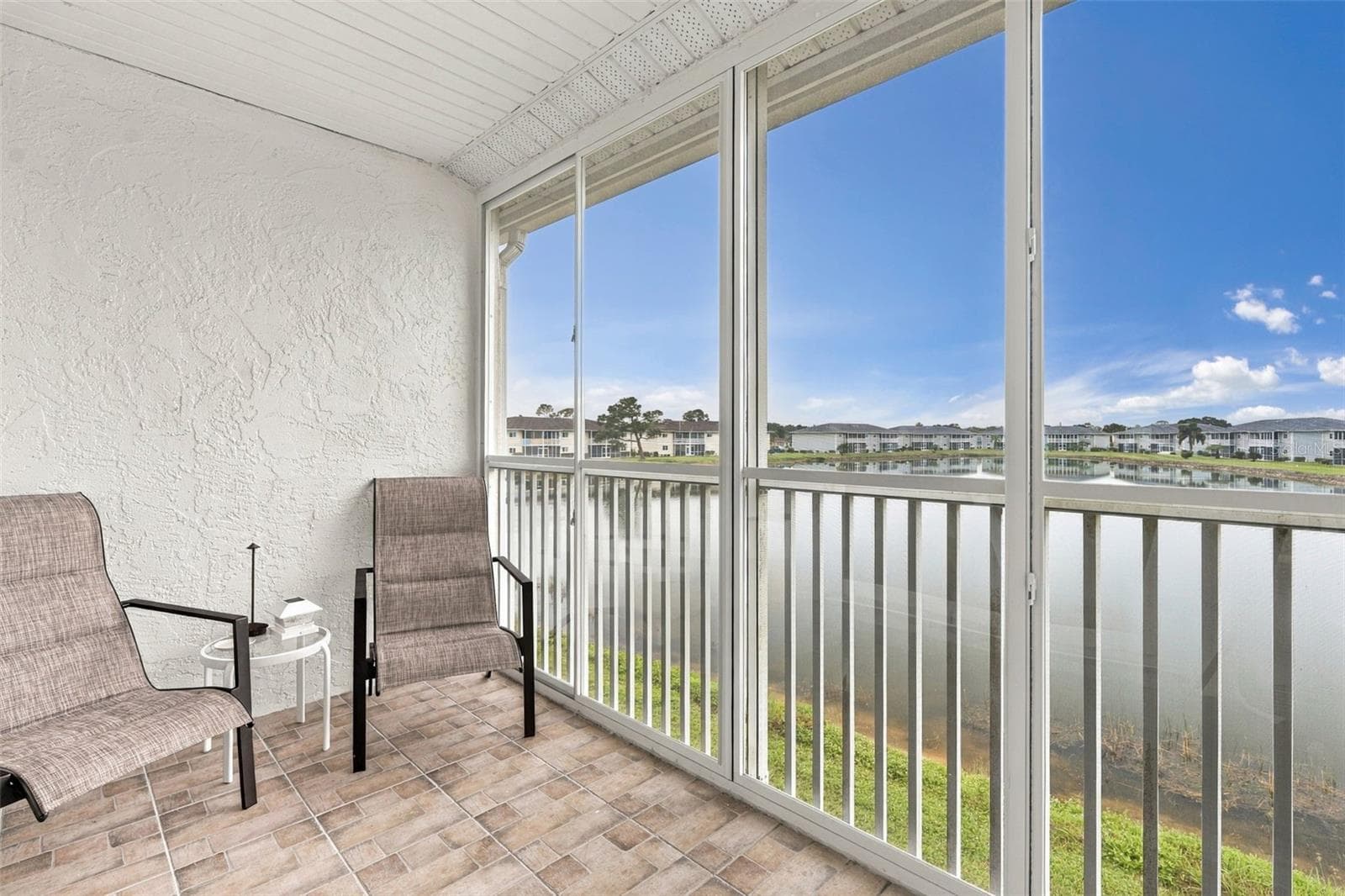 Breathtaking Panoramic Lake Views from Expansive Screened Lanai - 12538 SW KINGSWAY CIR #1008, LAKE SUZY