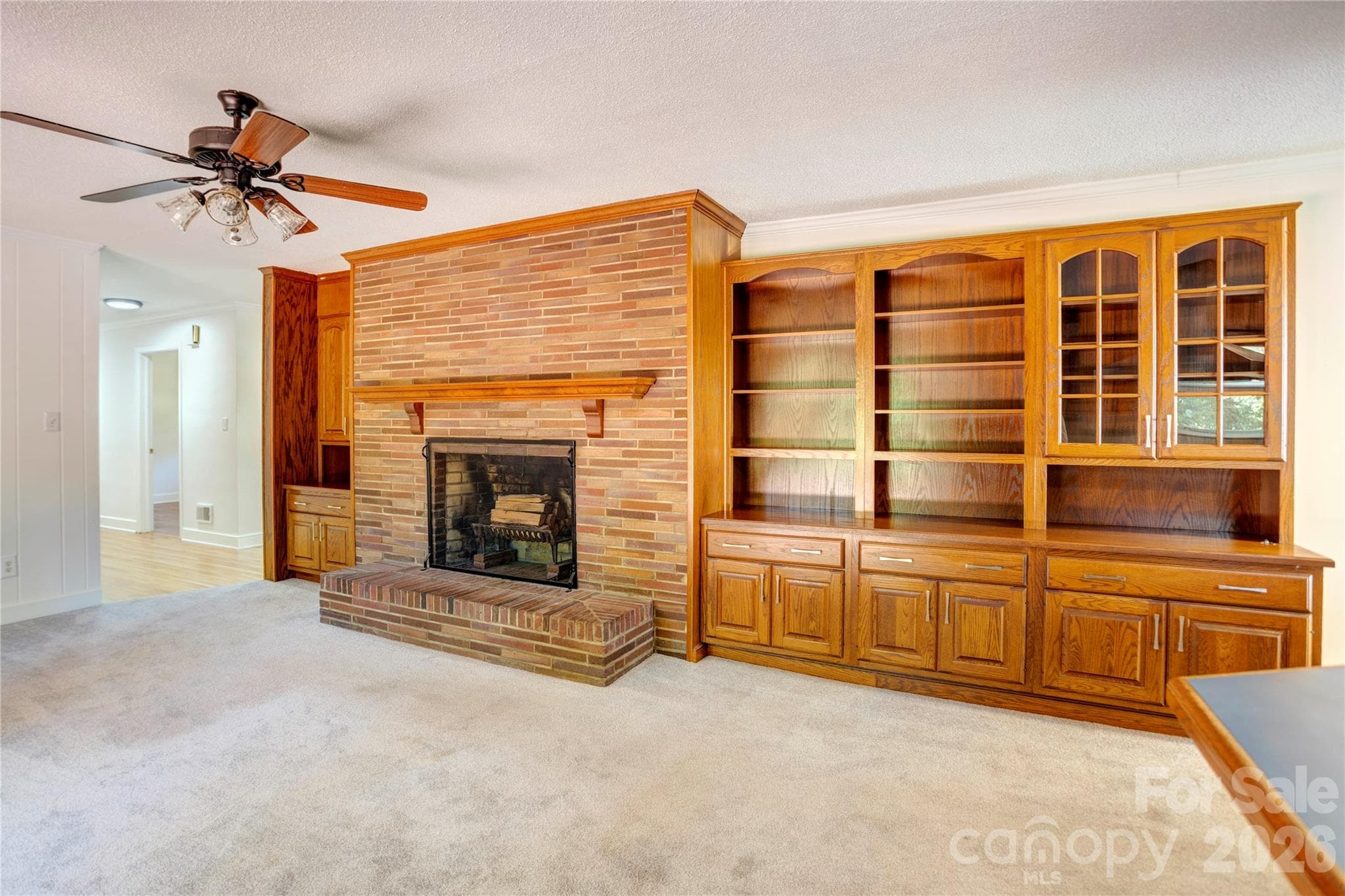 Brick fireplace and builtins - den area - 688 Grandview Drive NE, Concord