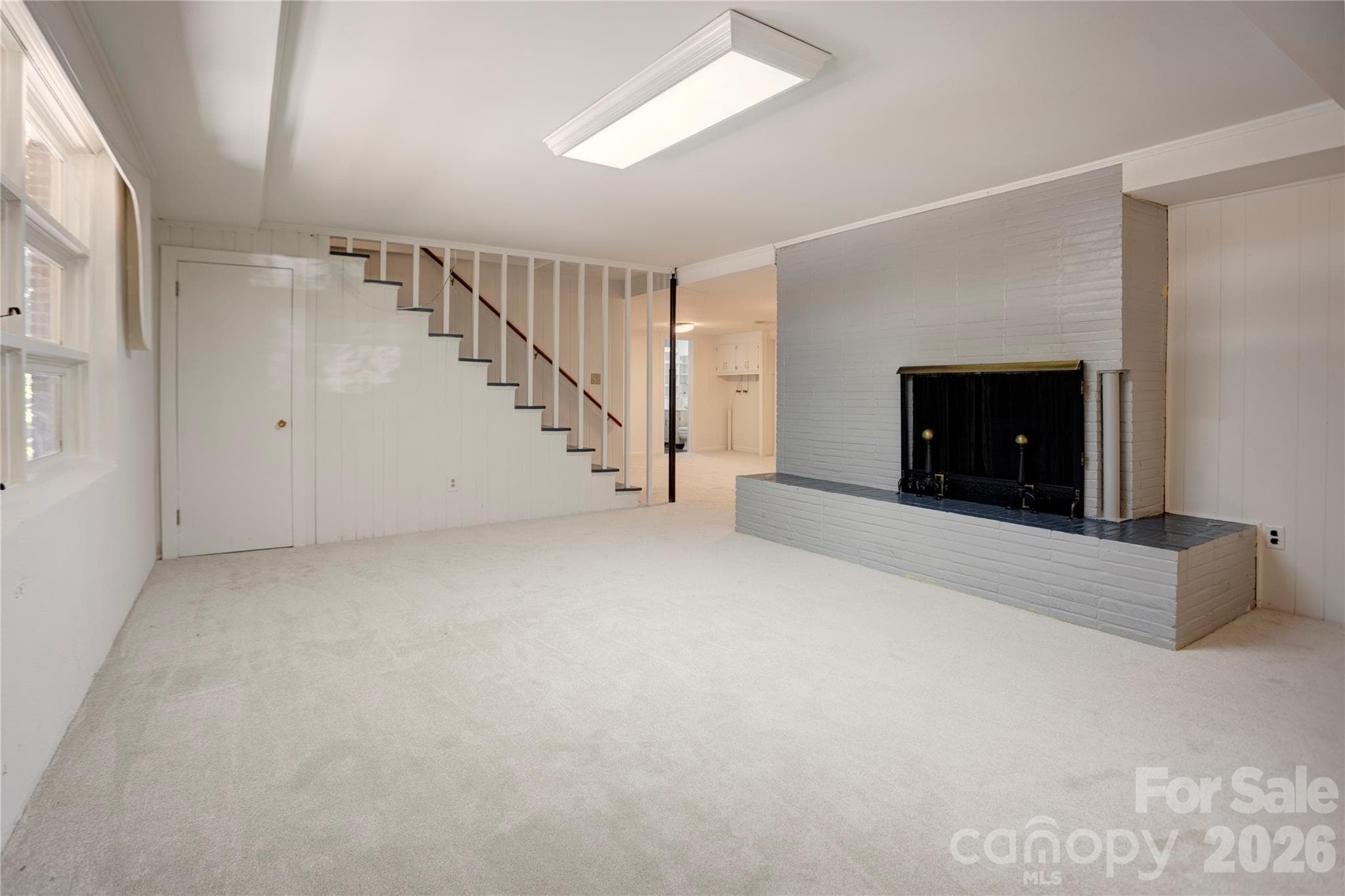 Family room (basement) - fireplace - 688 Grandview Drive NE, Concord