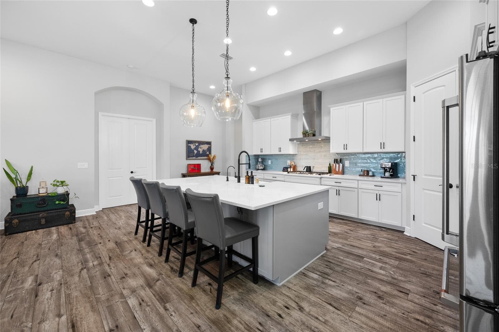 Kitchen has a 9 x 5 foot Quartz Island - 4161 GLADE WOOD LOOP, NEW PORT RICHEY