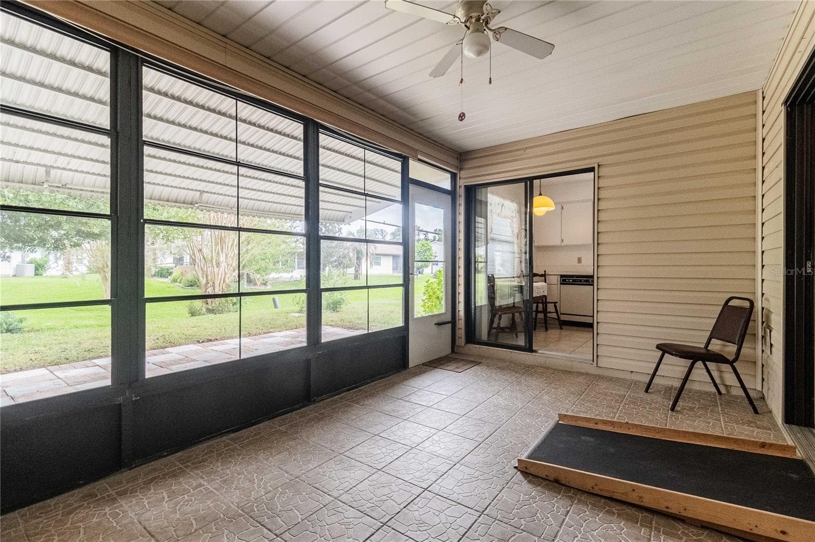 enclosed patio - 4912 DAWNVIEW LN, LAKELAND