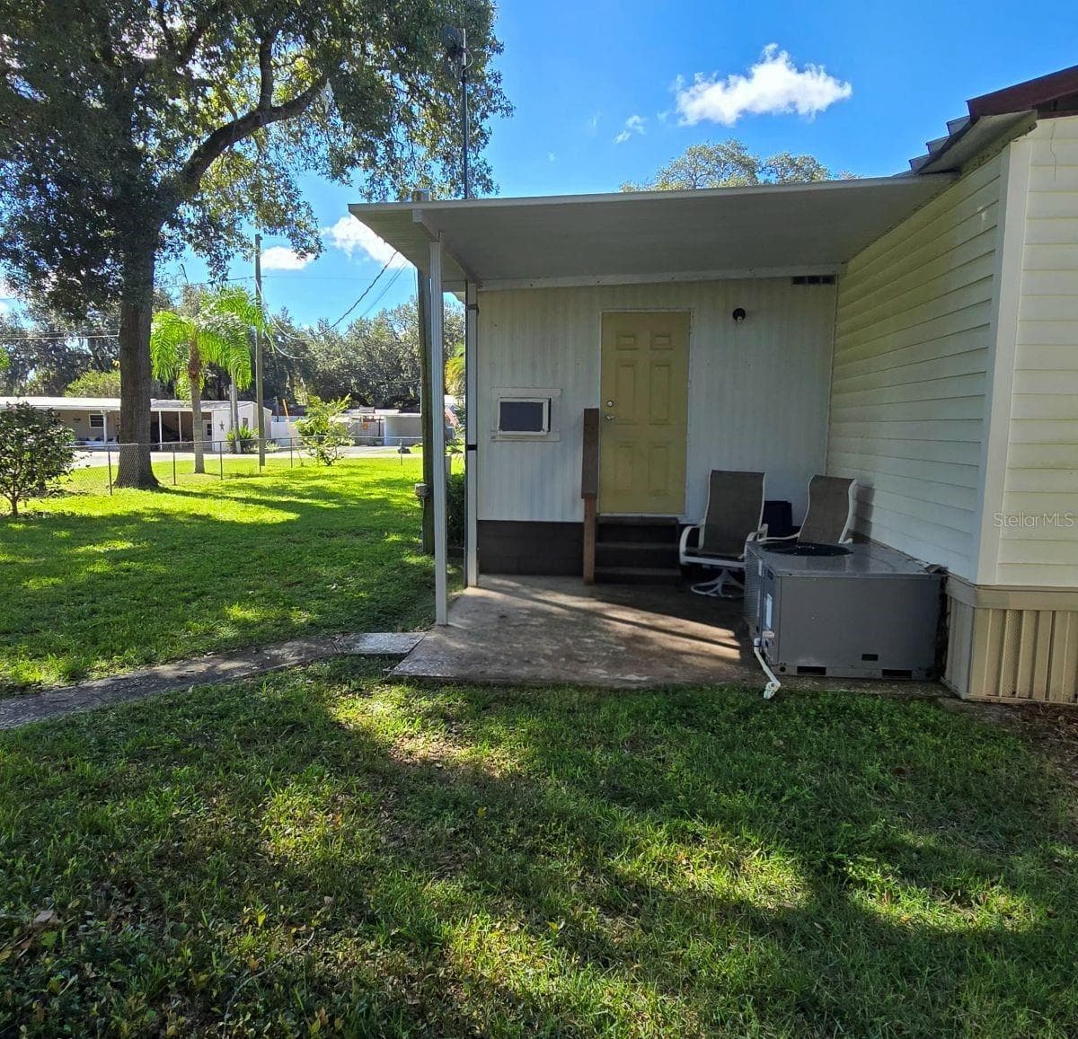 Back patio - 9849 SE 160TH LN, SUMMERFIELD