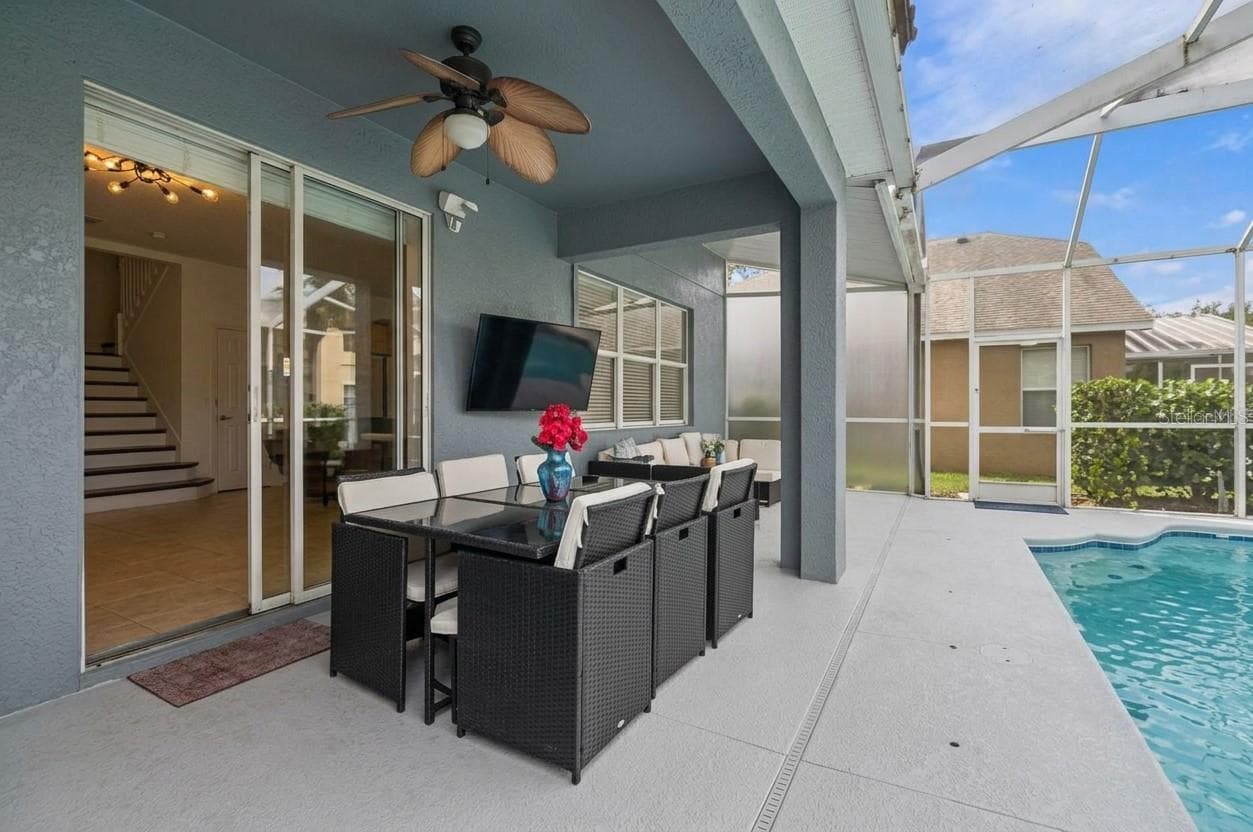 Your outdoor oasis offers a large covered lanai and a screened in pool. - 19025 FISHERMANS BEND DR, LUTZ