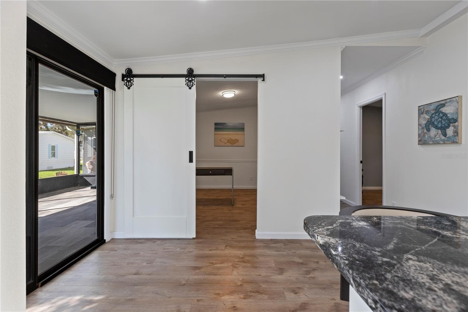 Barn Door to Den - 67 MEADOWLARK CIR, ELLENTON