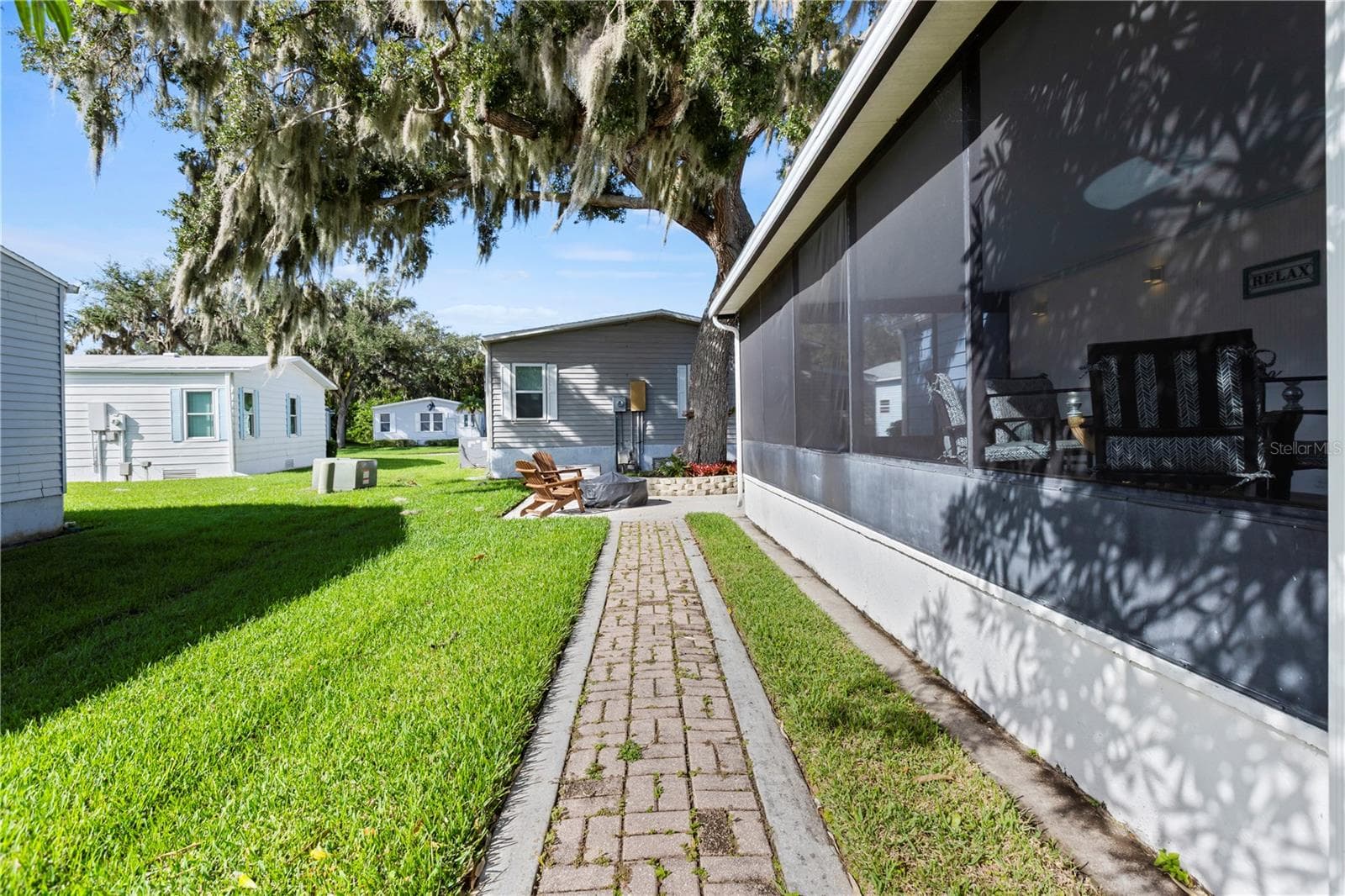 Sidewalk to Patio - 67 MEADOWLARK CIR, ELLENTON