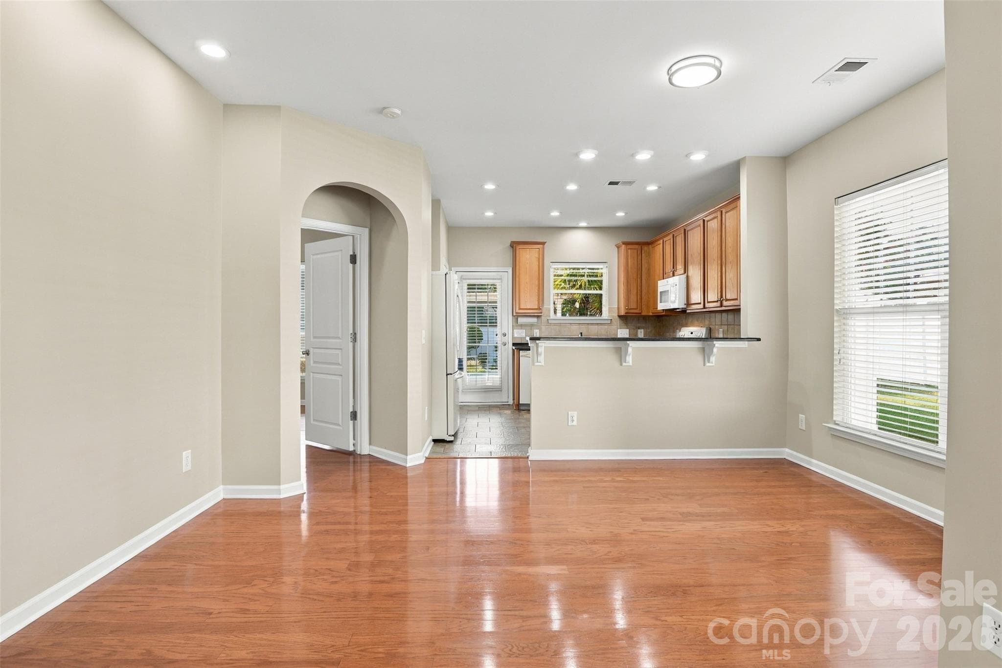 Arched doorway to the primary suite adds character and charm! - 608 Goldflower Drive, Rock Hill