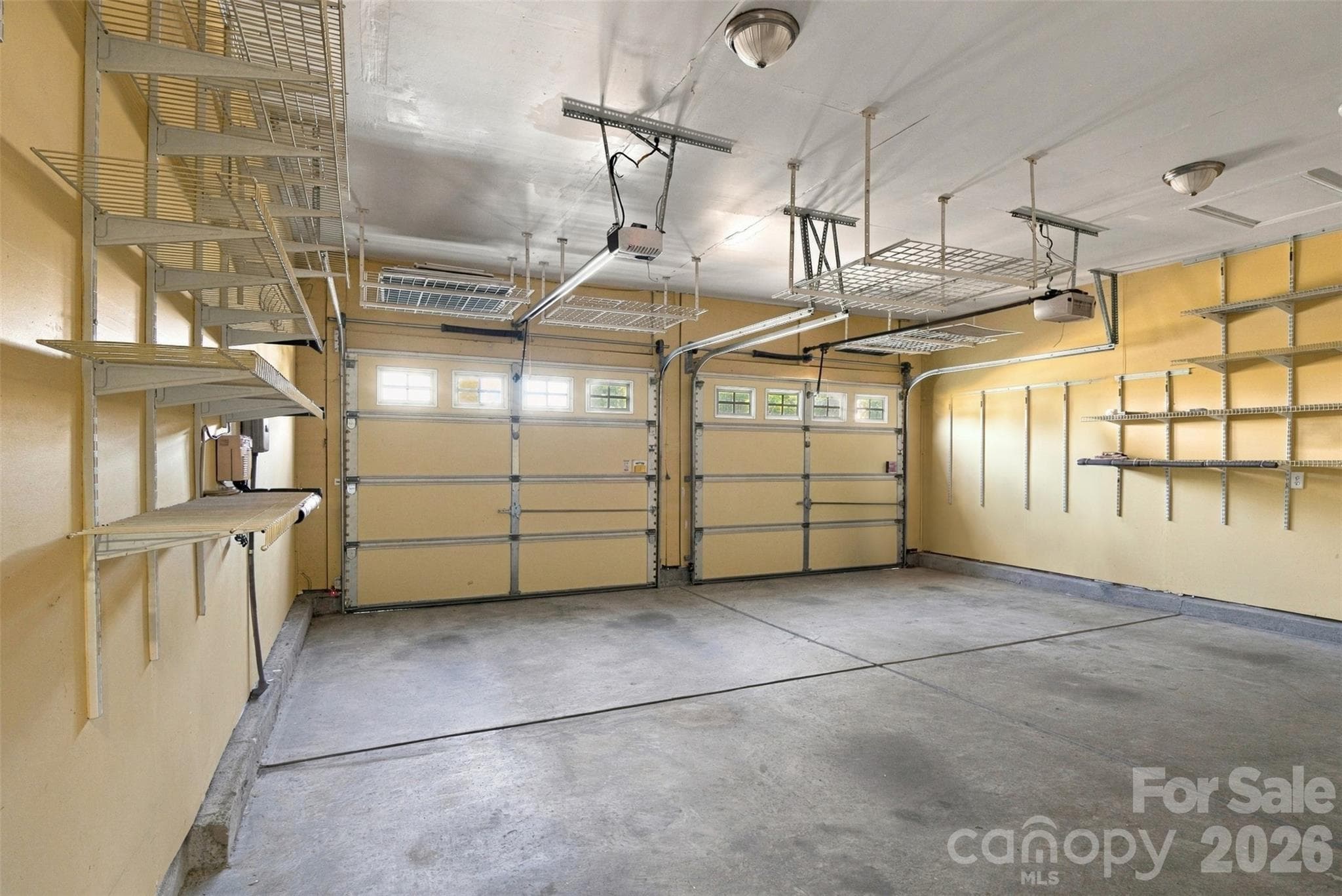 2 car garage with lots of shelves for storage! - 608 Goldflower Drive, Rock Hill