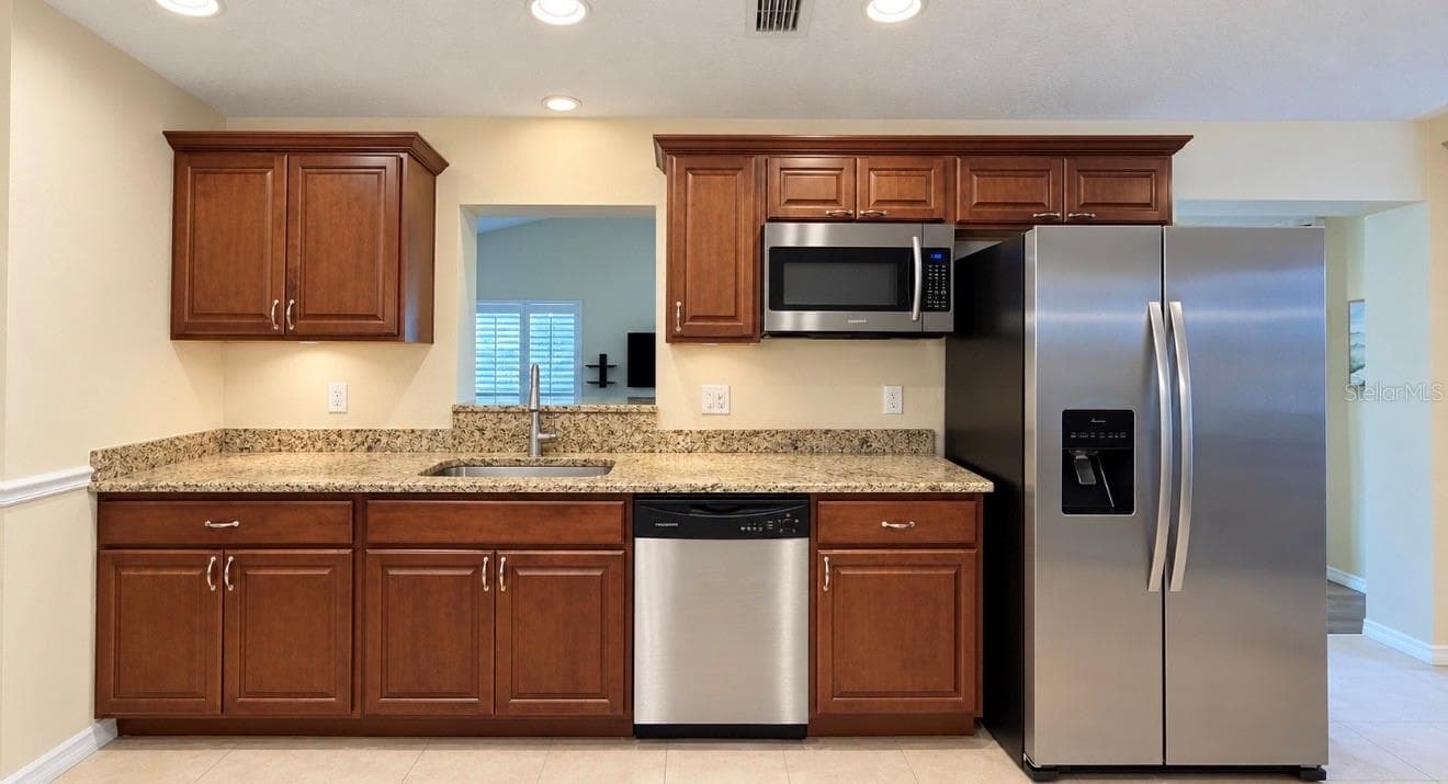 kitchen with stainless steel appliances - 1231 ROSEWOOD ST, LARGO