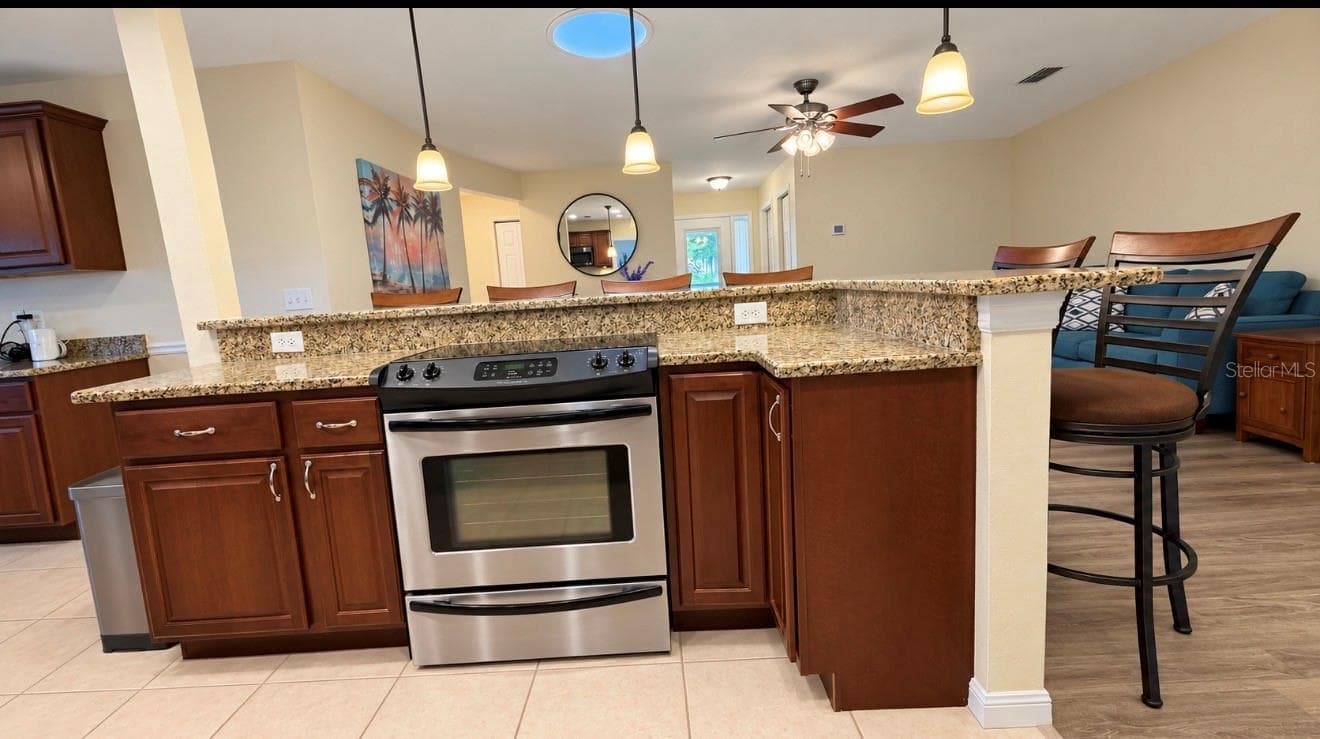 kitchen island with range - 1231 ROSEWOOD ST, LARGO