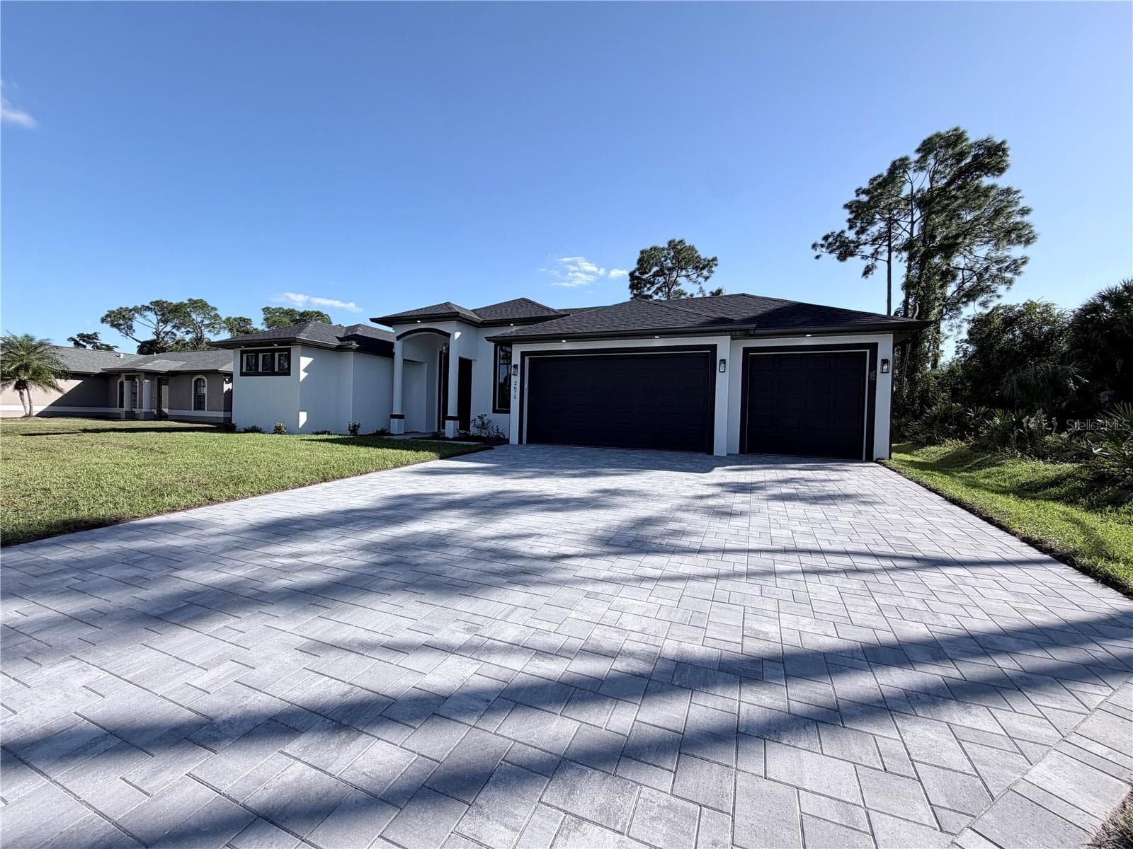 Front view 3 Car Garage Pavers Driveway - 2675 YACOLT AVE, NORTH PORT