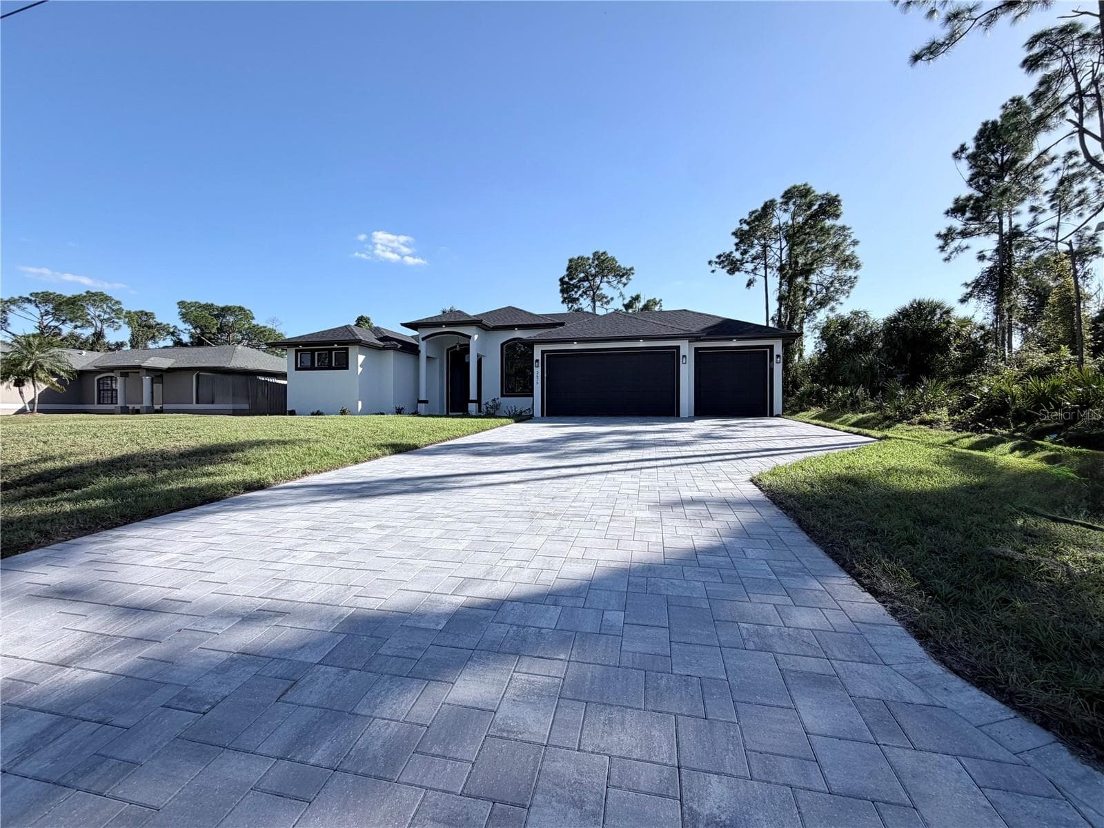Front view 3 Car Garage Pavers Driveway - 2675 YACOLT AVE, NORTH PORT