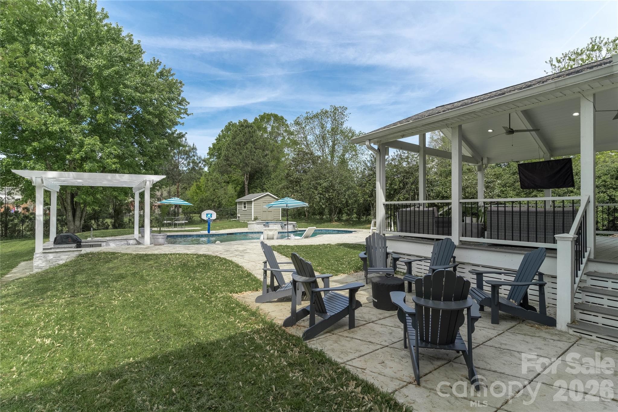 Enjoy making s'mores in the fire pit overlooking the fabulous pool - 16647 Greenfarm Road, Huntersville