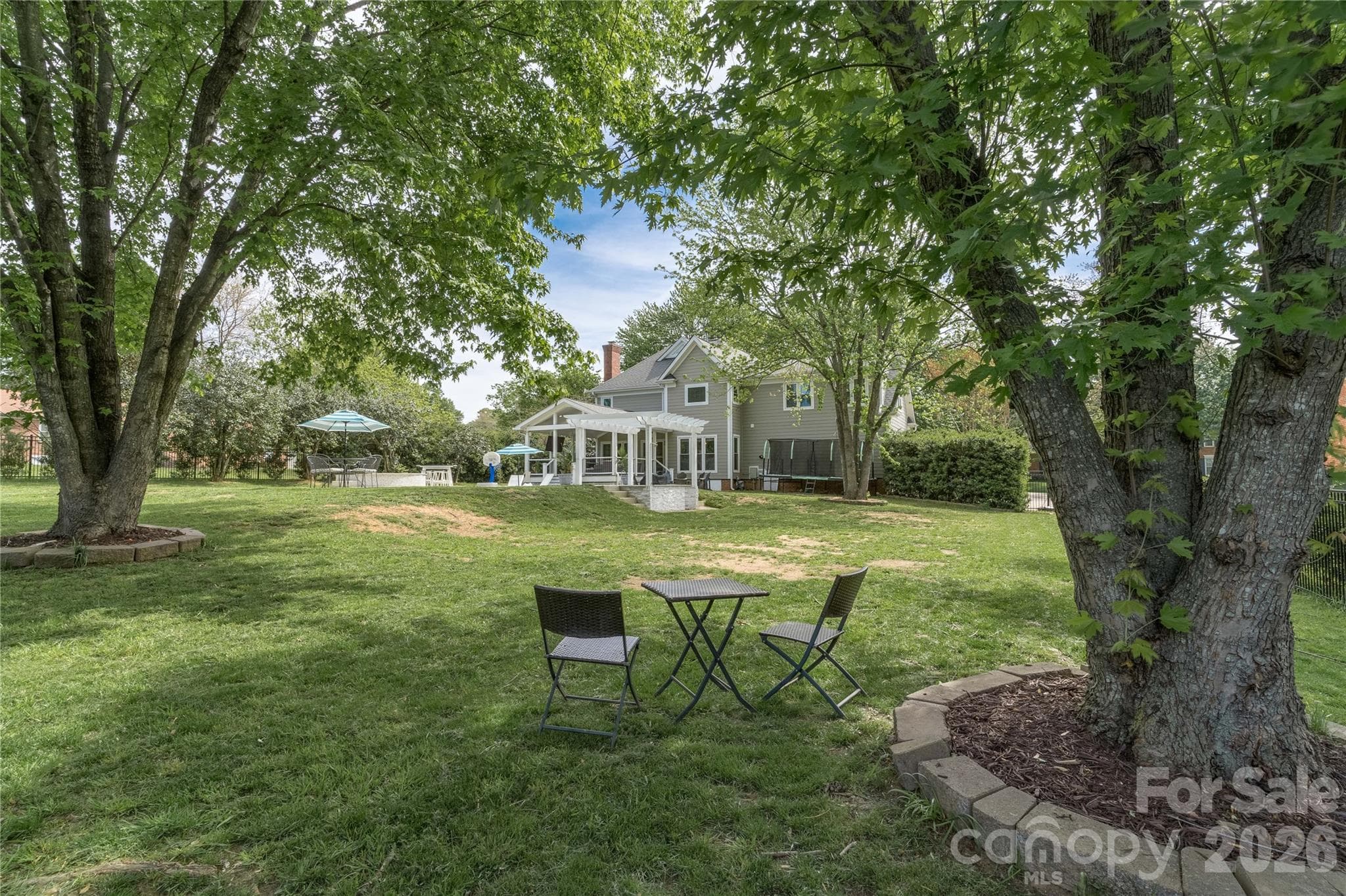 The backyard is massive and perfect for entertaining! - 16647 Greenfarm Road, Huntersville