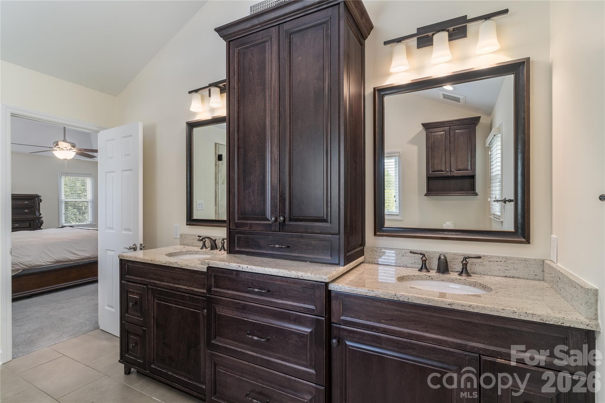 The luxurious Ensuite Master Bathroom has custom cabinetry, along with granite and marble - 16647 Greenfarm Road, Huntersville