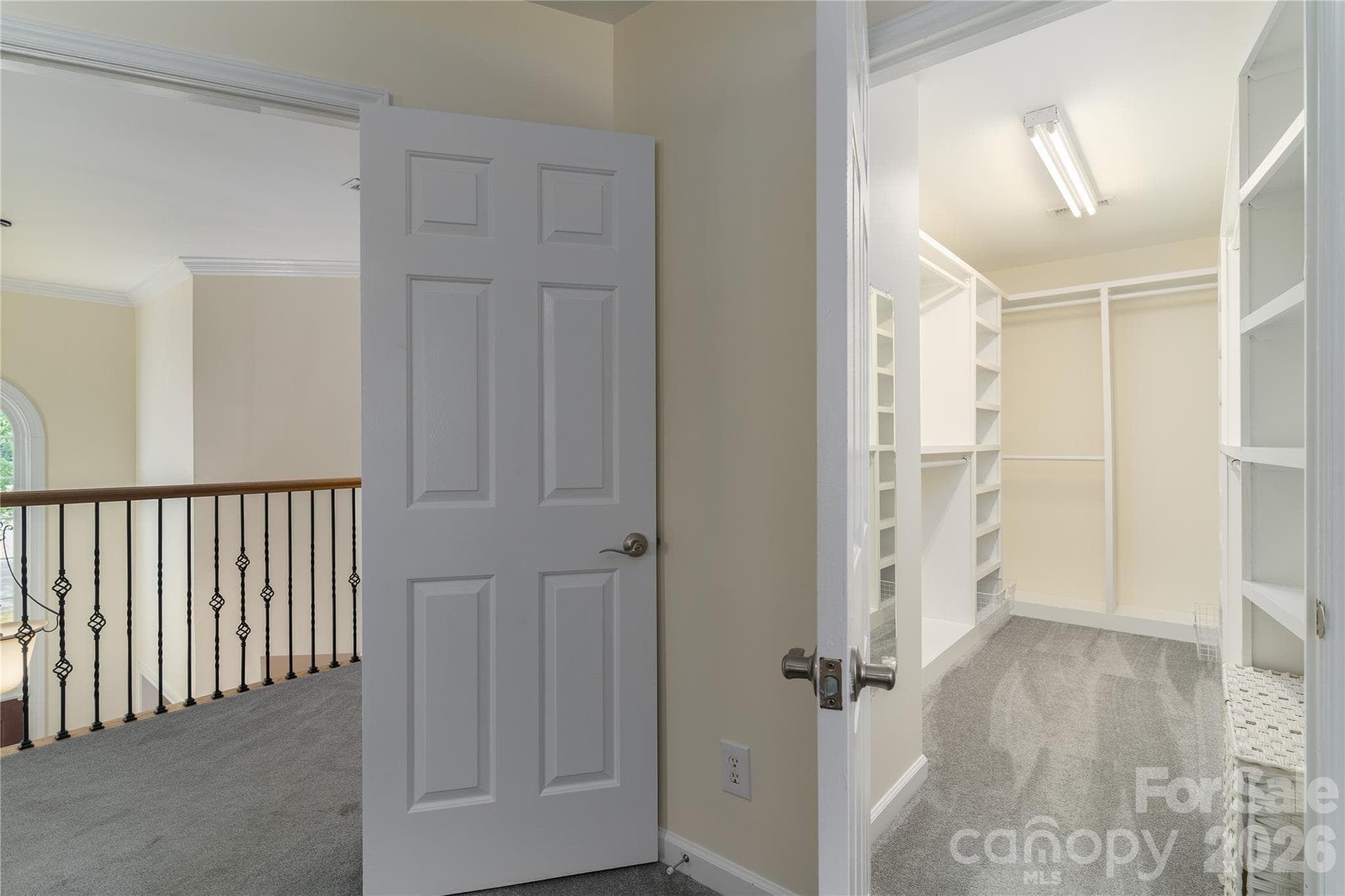 The large Master Closet is a walk-in closet with plenty of storage and space - 16647 Greenfarm Road, Huntersville