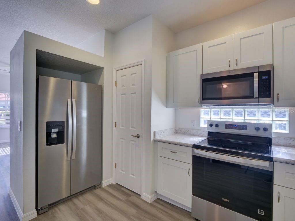Single Family Residence at 9013 HEATHLAND CT, MOUNT DORA, photo 12 of 73