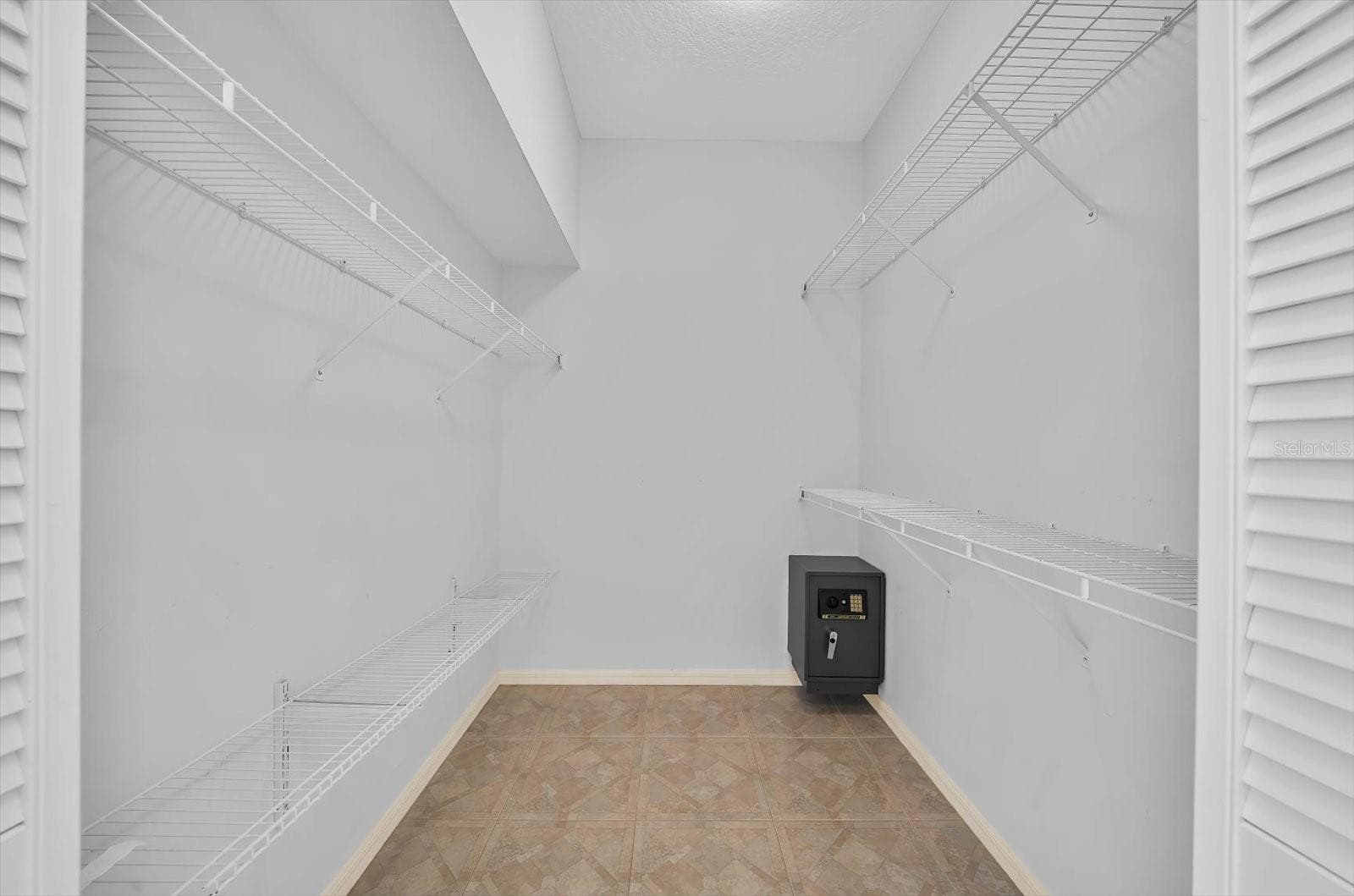 Primary bedroom walk-in closet - 3715 72ND AVE. CIR E, SARASOTA