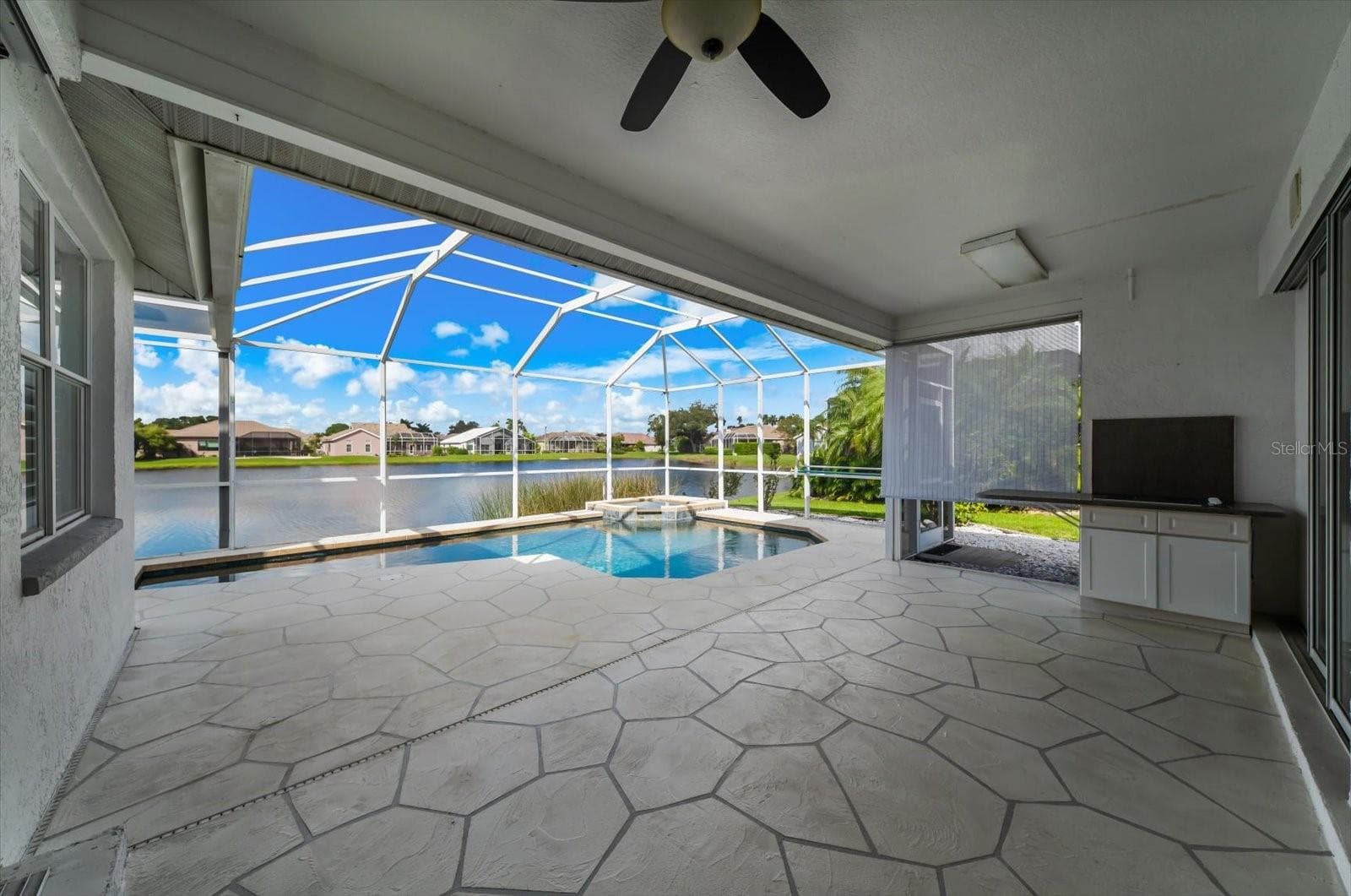 Covered lanai with out electric cooktop - 3715 72ND AVE. CIR E, SARASOTA