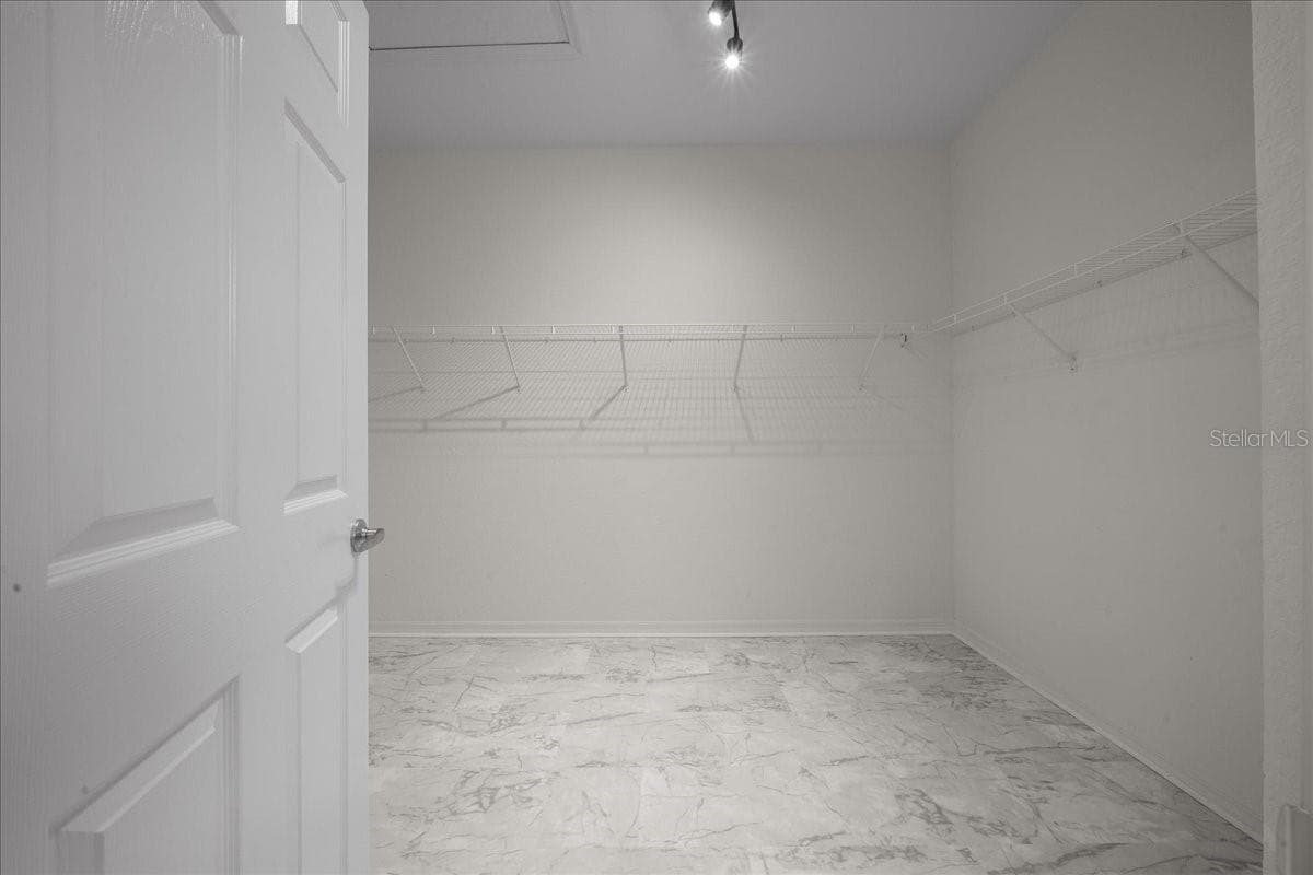 Primary walk-in closet - 5044 SW 104TH LOOP, OCALA