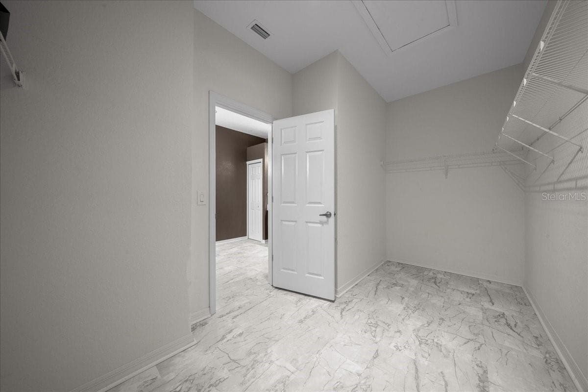 Primary walk-in closet - 5044 SW 104TH LOOP, OCALA