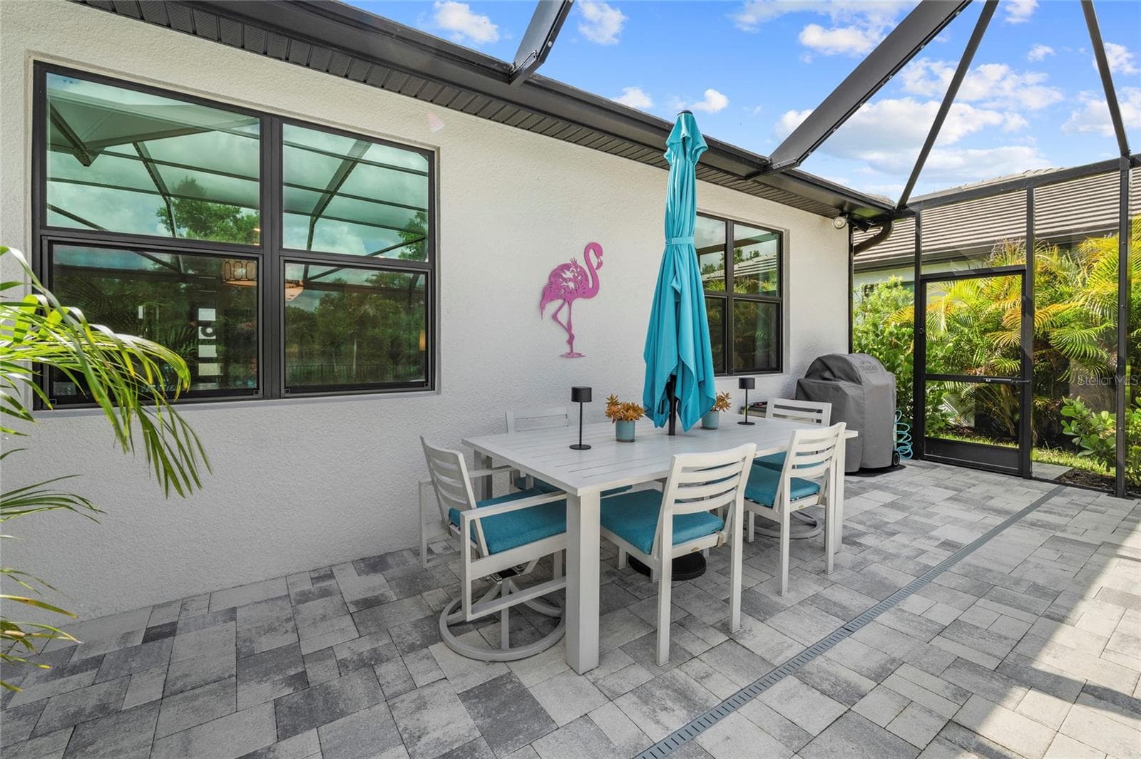 Entertainment spaces galore with outdoor dining! - 5437 SILVERSIDE PINE CT, LAKEWOOD RANCH