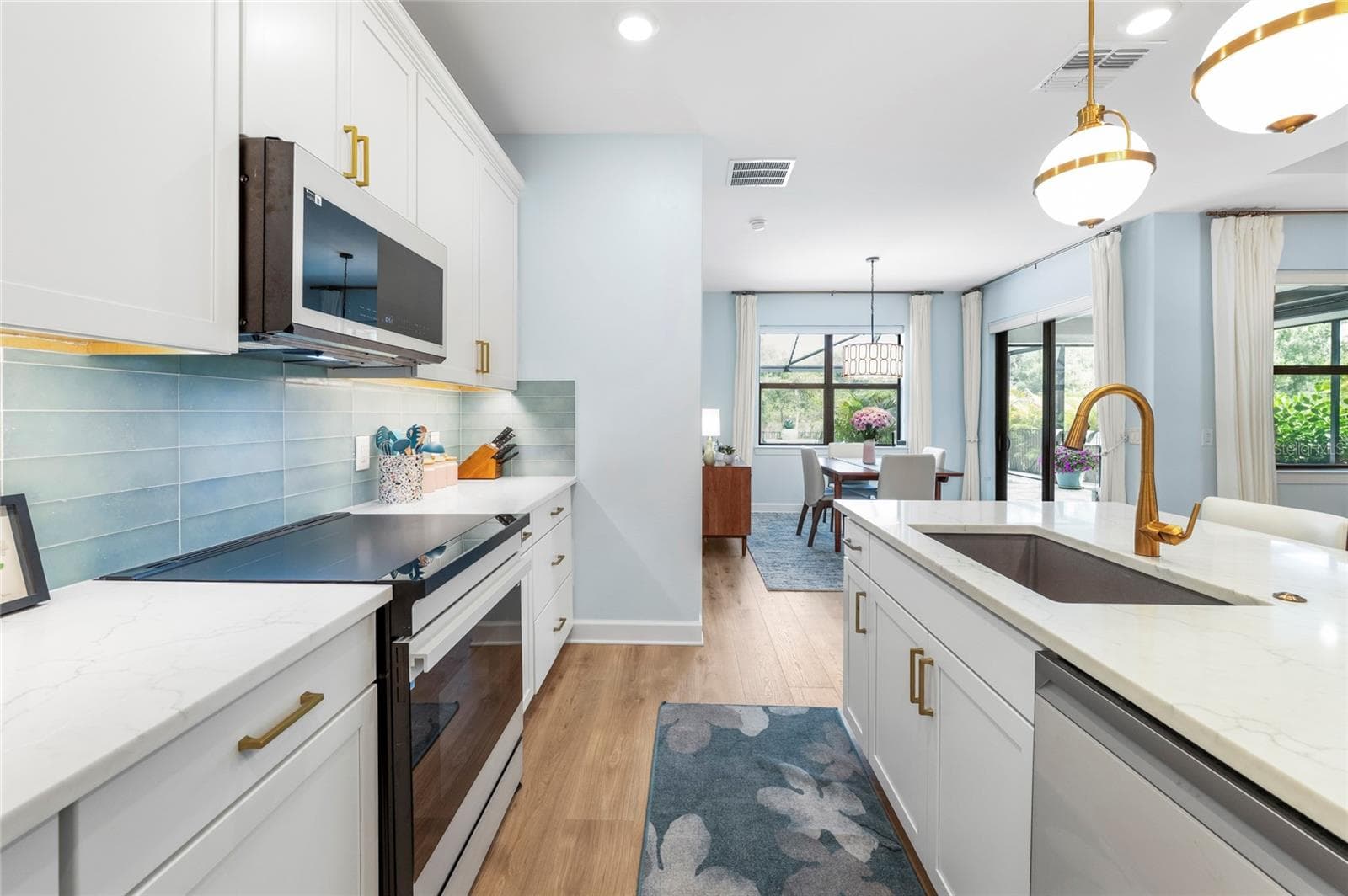Induction Stove and High End Design Backsplash - 5437 SILVERSIDE PINE CT, LAKEWOOD RANCH