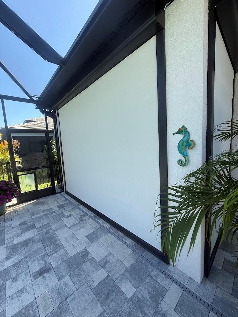 Electric Remote Hurricane Screens to store your patio furniture! - 5437 SILVERSIDE PINE CT, LAKEWOOD RANCH