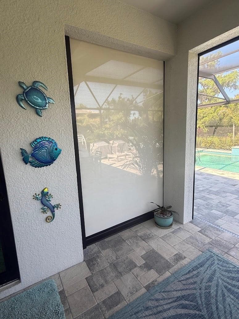 Electric Remote Hurricane Screens to store your patio furniture! - 5437 SILVERSIDE PINE CT, LAKEWOOD RANCH