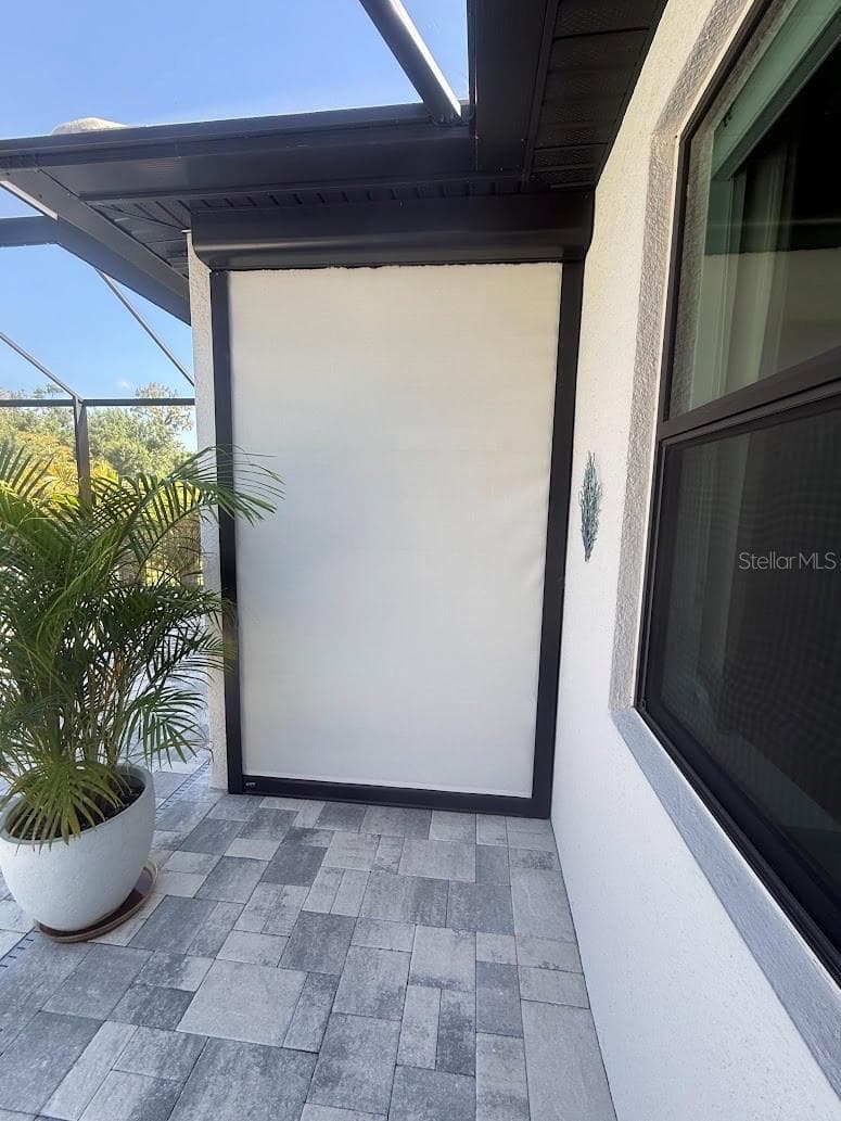Electric Remote Hurricane Screens to store your patio furniture! - 5437 SILVERSIDE PINE CT, LAKEWOOD RANCH