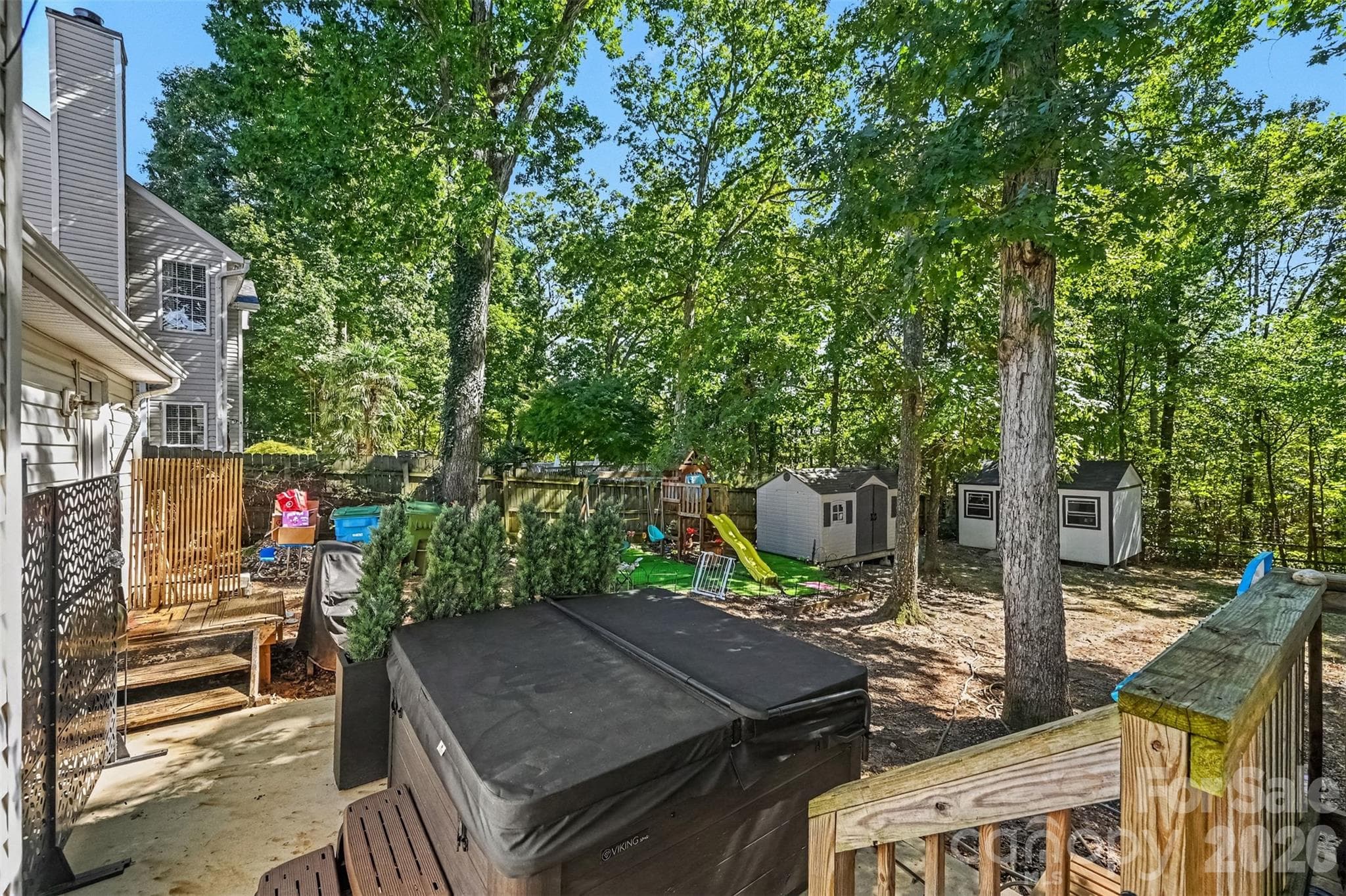 Patio added with newer hot tub that conveys - 129 Shade Tree Circle, Fort Mill