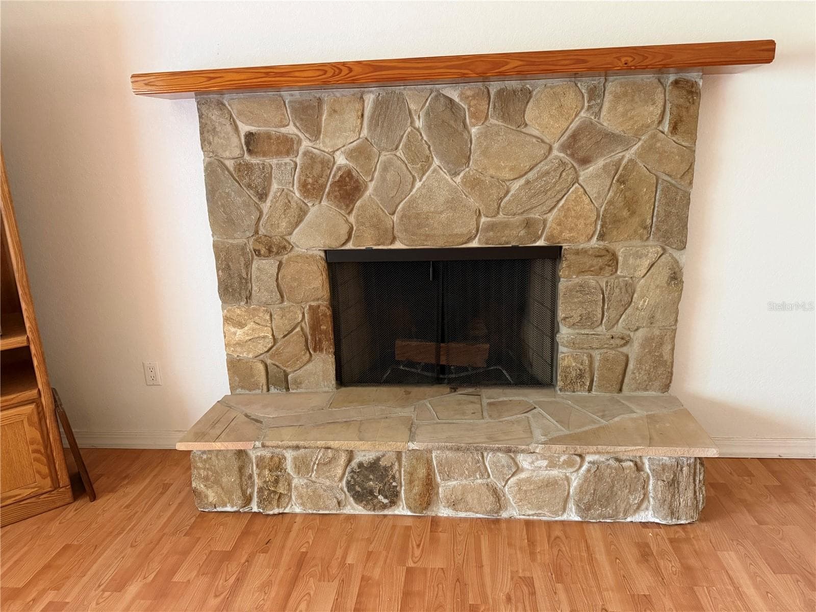 Stone fireplace - 43 BULOW WOODS CIRCLE CIR, FLAGLER BEACH