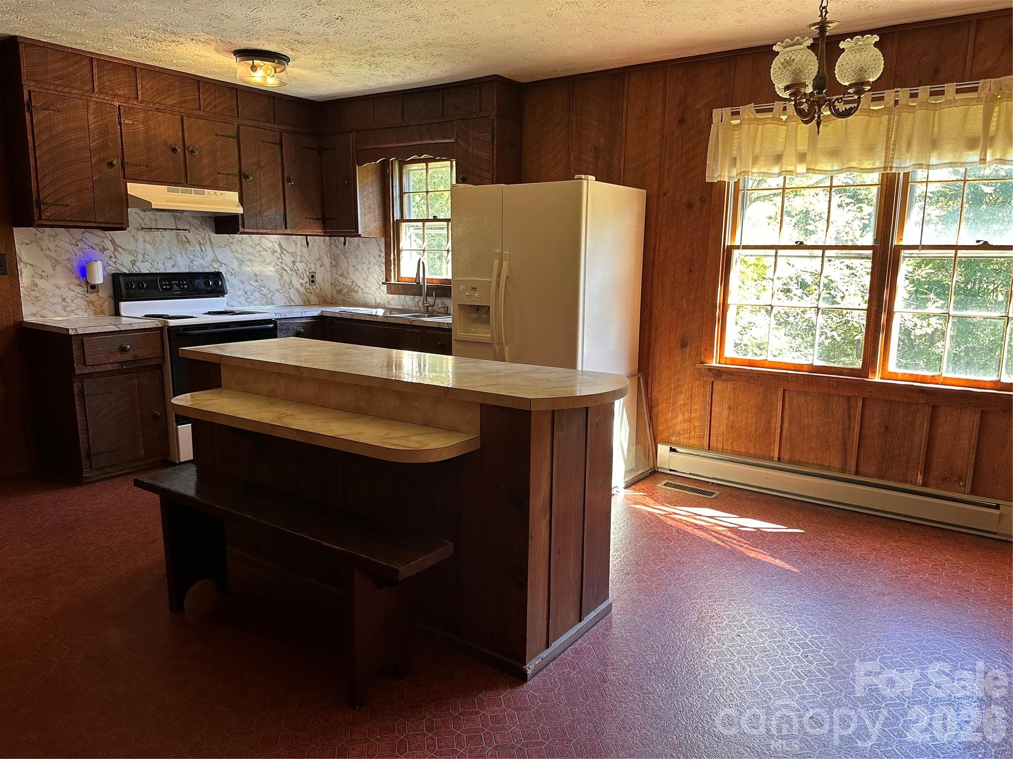 Island with bench - 2727 Haas Lane, Lenoir