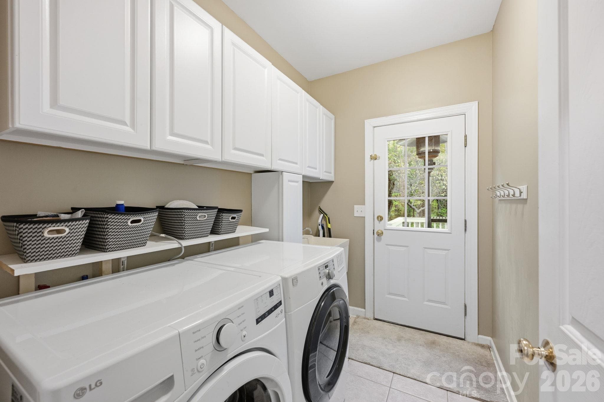 Laundry with separate entrance - 5704 Snapdragon Lane, Huntersville