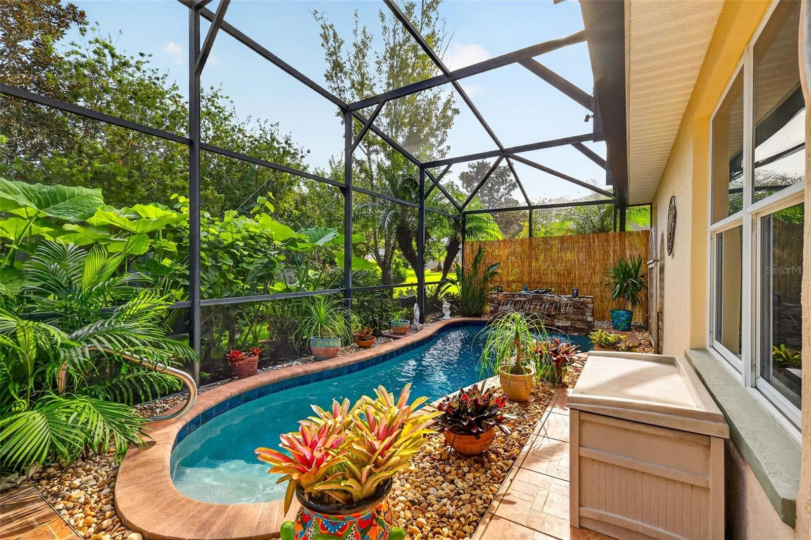 Lagoon Swimming Pool with Waterfall and Tropical PRIVACY Landscaping! - 6121 HUNTERS RIDGE AVE, LEESBURG