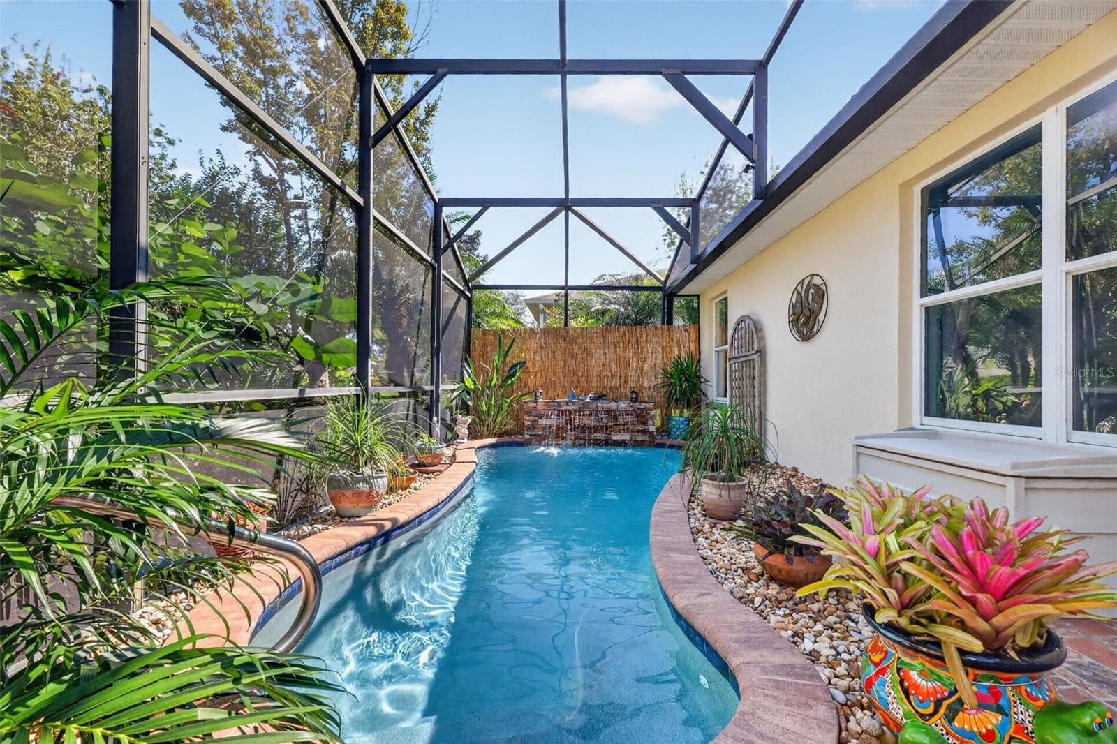 Lagoon Swimming Pool with Waterfall and Tropical PRIVACY Landscaping! - 6121 HUNTERS RIDGE AVE, LEESBURG