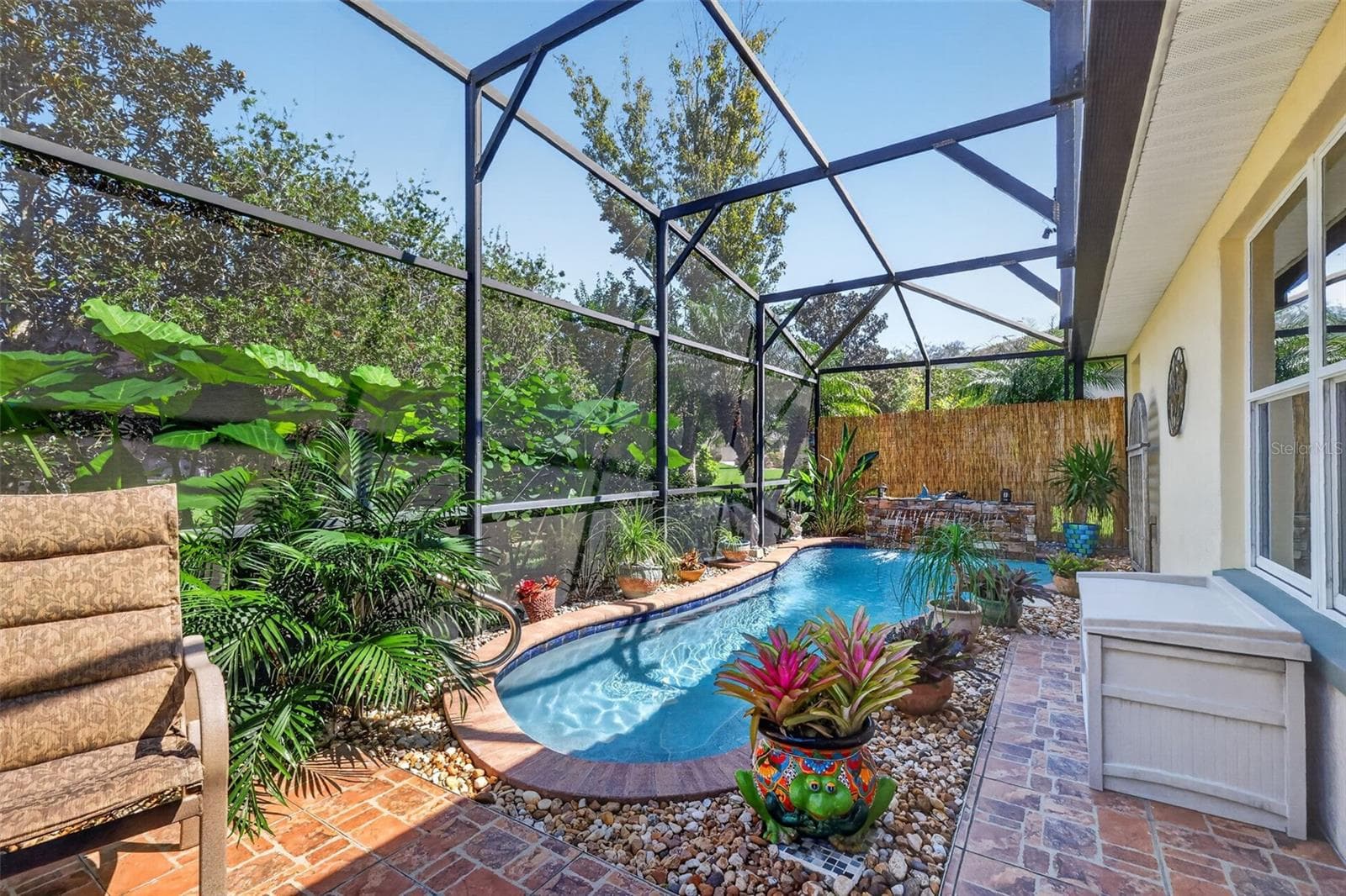 Lagoon Swimming Pool with Waterfall and Tropical PRIVACY Landscaping! - 6121 HUNTERS RIDGE AVE, LEESBURG