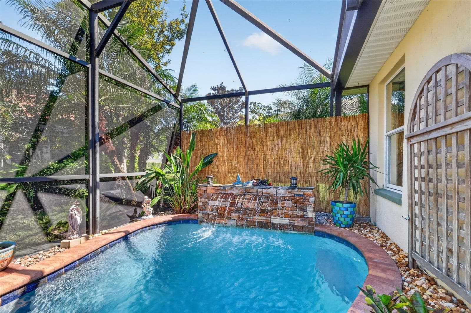 Lagoon Swimming Pool with Waterfall and Tropical PRIVACY Landscaping! - 6121 HUNTERS RIDGE AVE, LEESBURG