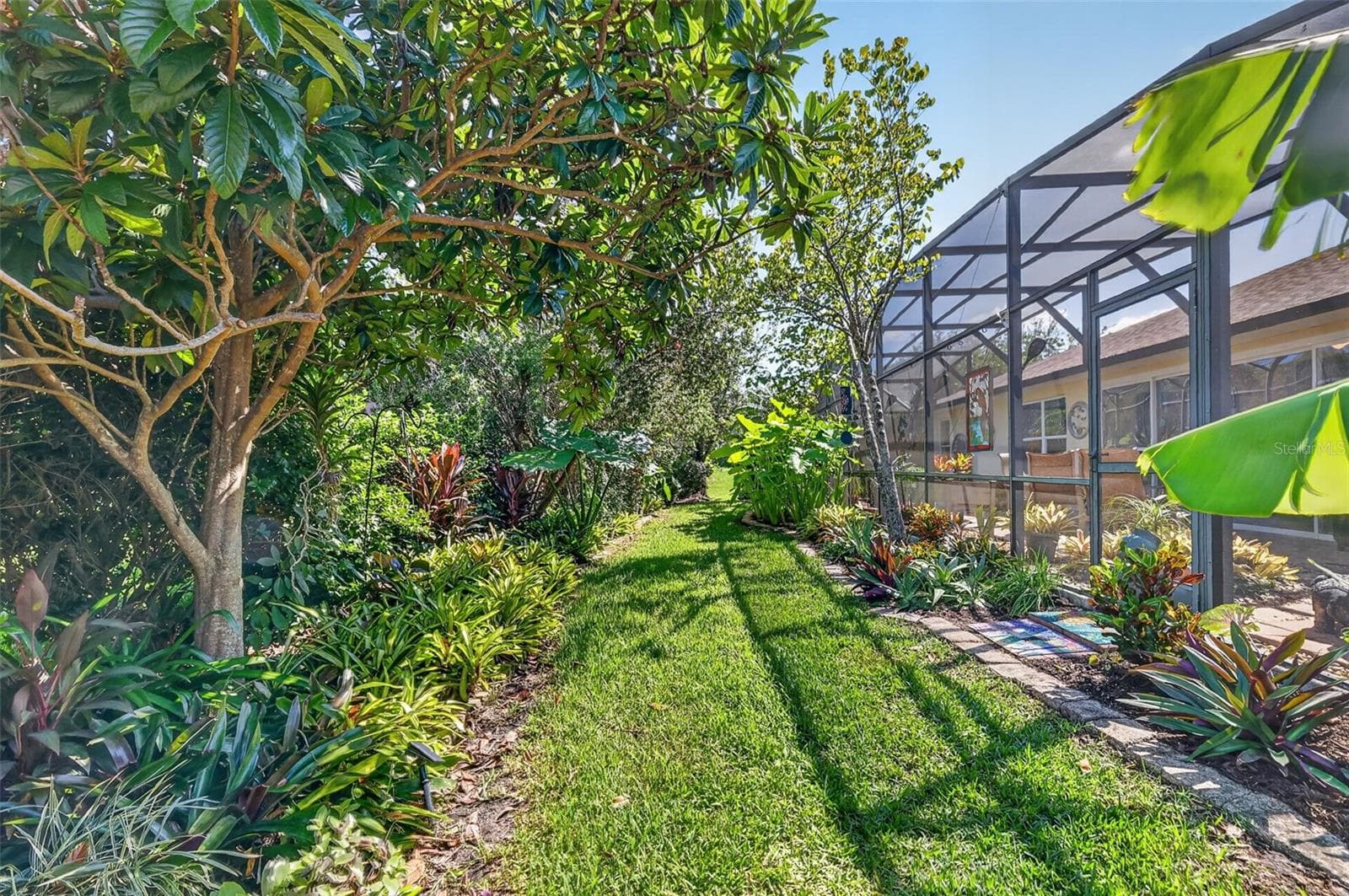 Rear Elevation with Tropical PRIVACY Landscaping! - 6121 HUNTERS RIDGE AVE, LEESBURG